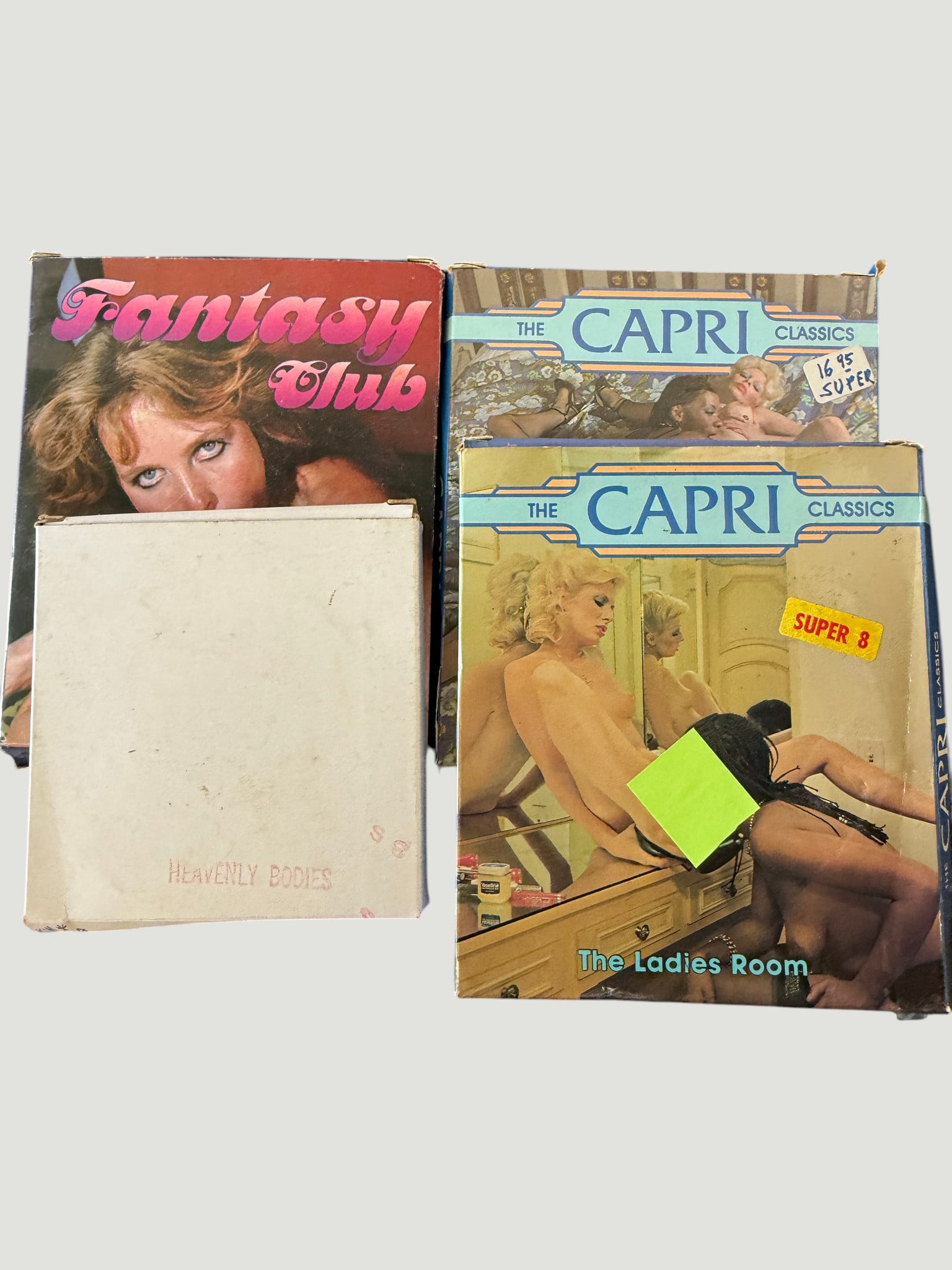 Vintage Adult Super 8mm Film & Collectibles Lot – 1970s/80s, 4 Items: A collection of vintage adult entertainment collectibles comprising four items: two Super 8mm film reels in original boxes including 'Gypsy Women' (OZ Films, Super 8) and 'Hollywood Hooters Fuck-A-Tho