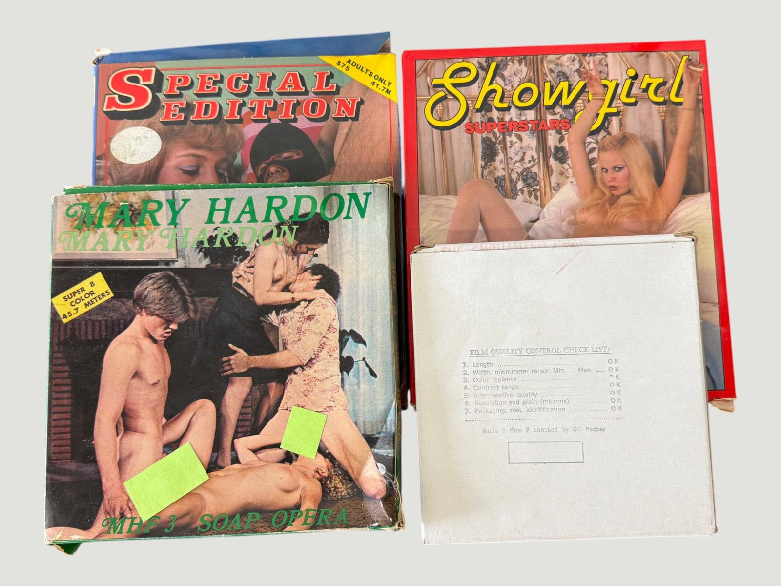 Vintage Adult Super 8mm Film & Collectibles Lot – 1970s/80s, 4 Items: A collection of vintage adult entertainment collectibles comprising four items: two Super 8mm film reels in original boxes including 'Gypsy Women' (OZ Films, Super 8) and 'Hollywood Hooters Fuck-A-Tho