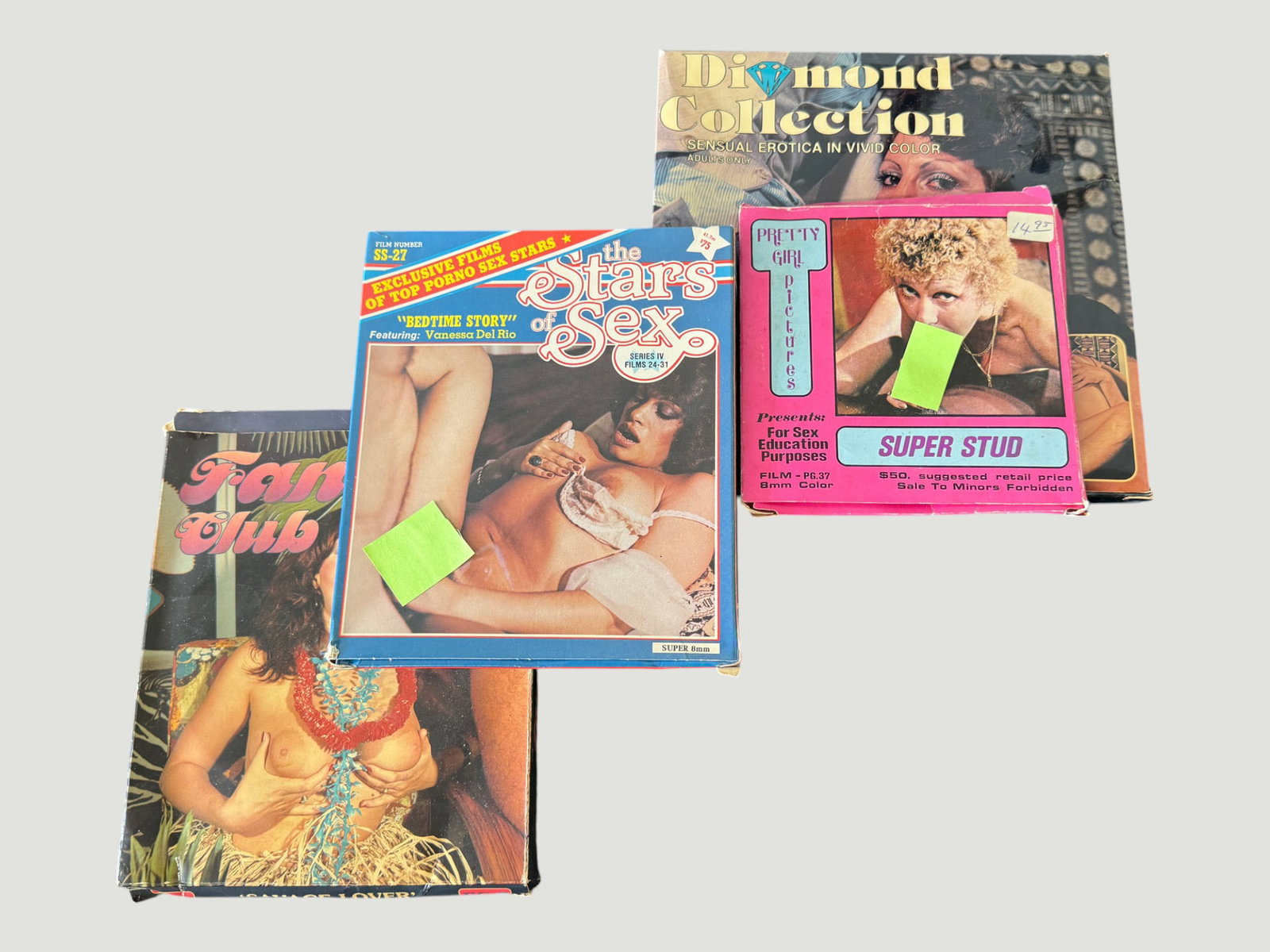 Vintage Adult Super 8mm Film & Collectibles Lot – 1970s/80s, 4 Items: A collection of vintage adult entertainment collectibles comprising four items: two Super 8mm film reels in original boxes including 'Gypsy Women' (OZ Films, Super 8) and 'Hollywood Hooters Fuck-A-Tho