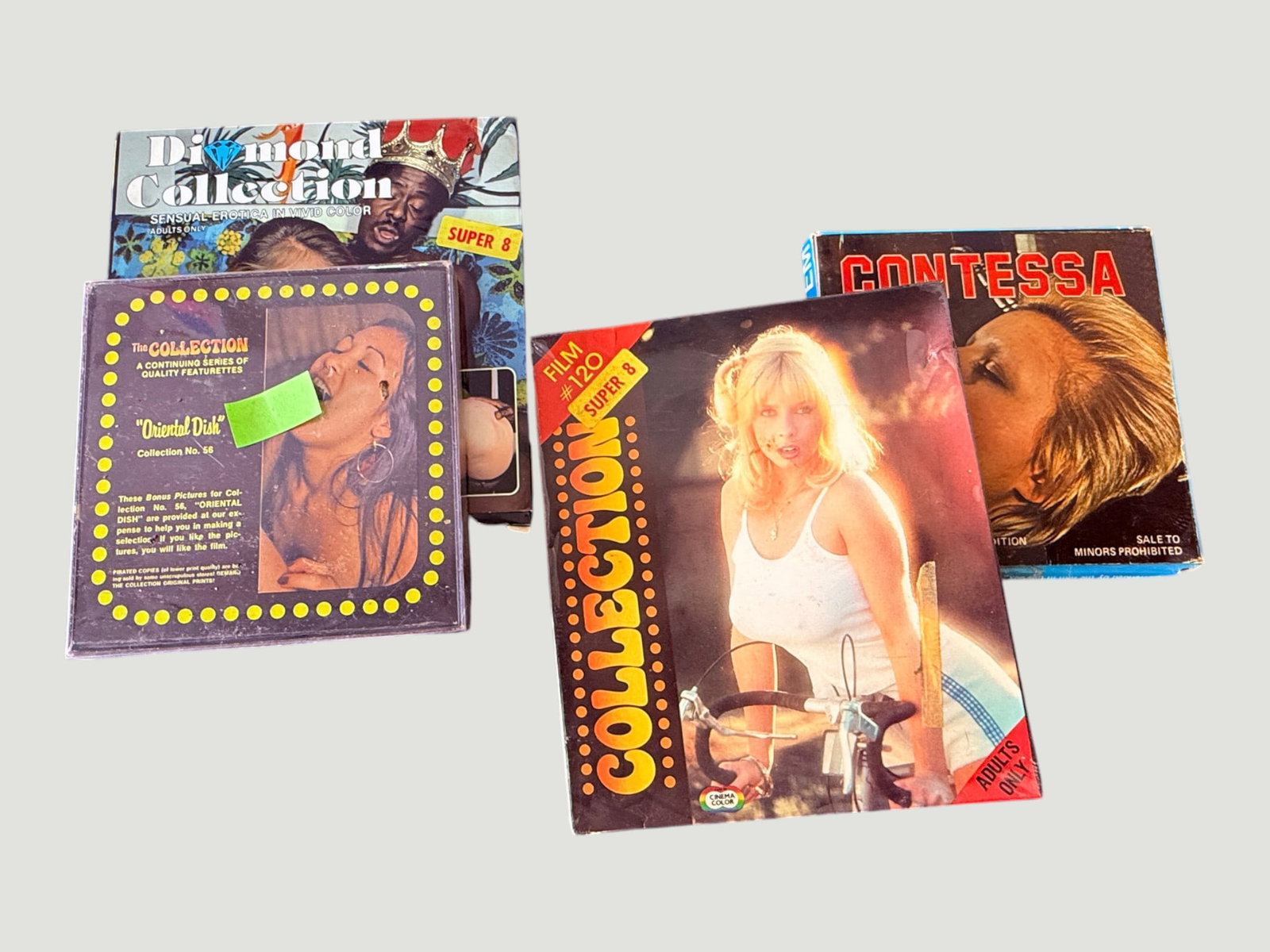 Vintage Adult Super 8 Film Collection - Diamond, Collection, Contessa (4 Items): A group of four vintage Super 8mm adult film reels in original packaging, dating from approximately the late 1970s to early 1980s. Titles include 'Diamond Collection' (Sensual Erotica in Vivid Color),