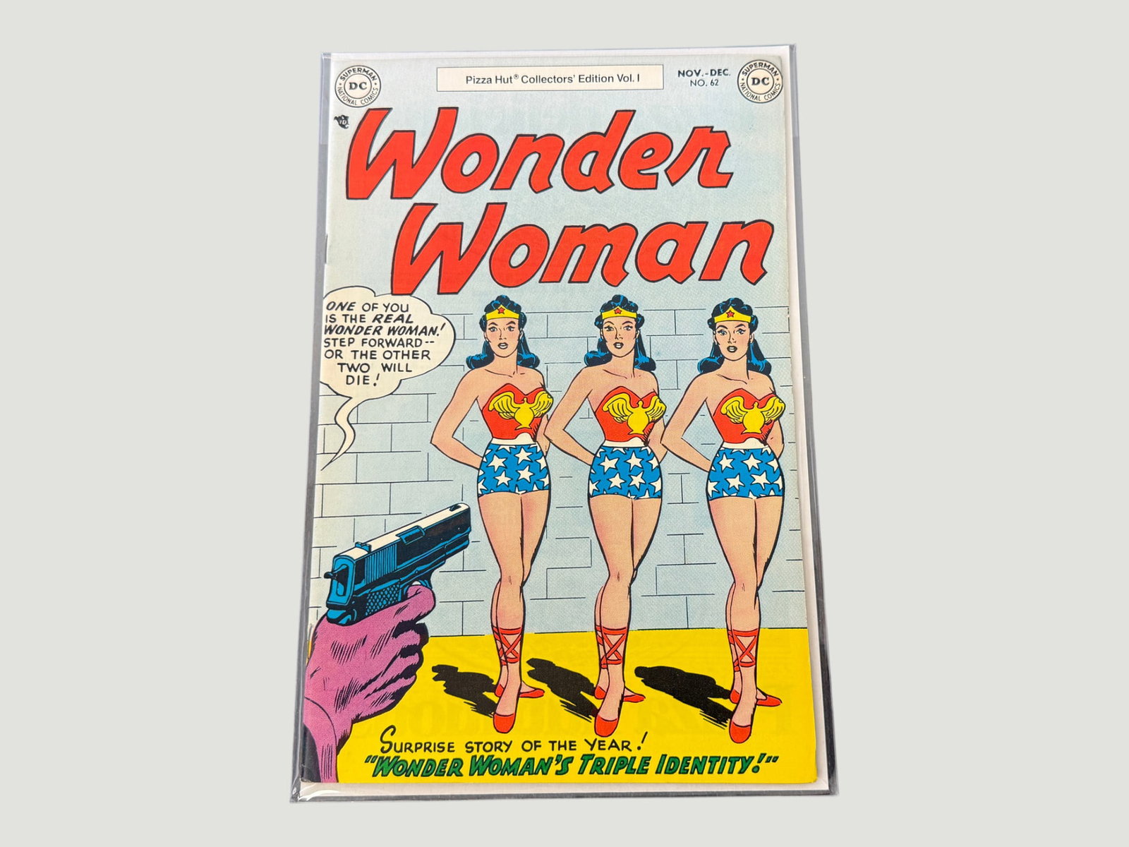 Wonder Woman #62 DC Comics Nov-Dec 1953 Pizza Hut Collectors' Edition Vol. I: A remarkable Pizza Hut Collectors' Edition Vol. I reprint of Wonder Woman #62 (Nov-Dec 1953), published by DC National Comics. The cover features the iconic story 'Wonder Woman's Triple Identity!' dep