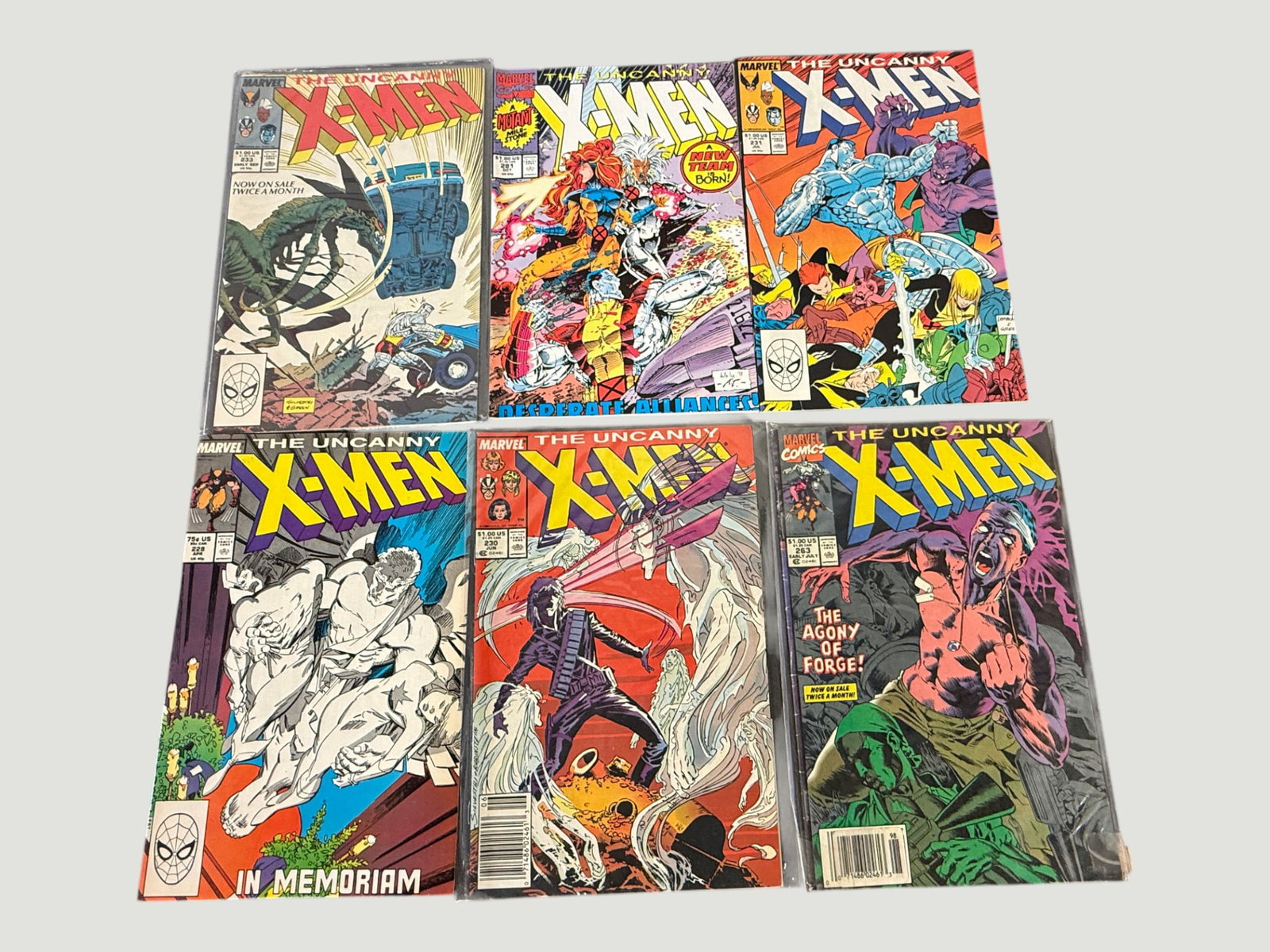 Marvel Uncanny X-Men Comic Lot x6 | Issues #228, #230, #233, #251, #263 & More: A collection of six Marvel Comics 'The Uncanny X-Men' issues from the late 1980s to early 1990s, including issue numbers approximately #228, #230, #233, #251, #263, and one additional issue. This era 