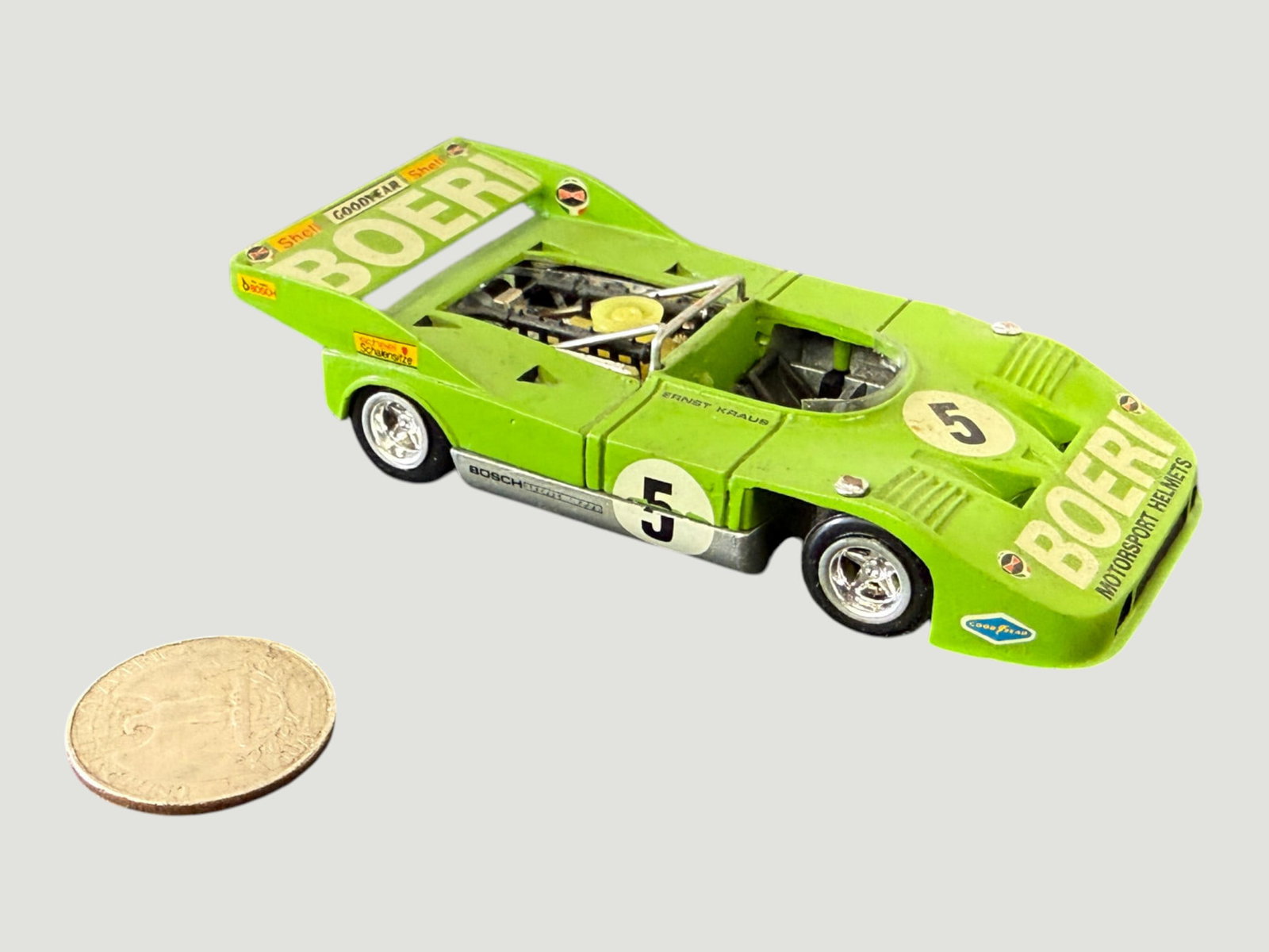 Diecast Model Car #5 Boeri Motorsport Helmets Racing Livery, c.1970s, 1:43: A 1:43 scale diecast model racing car finished in lime green livery representing the Boeri Motorsport Helmets sponsored entry, race number 5, associated with driver Ernst Kraus. The model features per