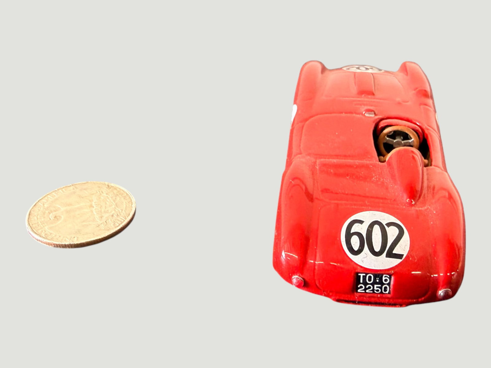 Vintage Diecast Red Racing Car Model #602 Mille Miglia, TO 6 2250 Plate: A small-scale diecast metal model of a vintage Italian open-top racing car, painted in classic Italian racing red, bearing race number 602 on a white oval roundel and a period Italian license plate re