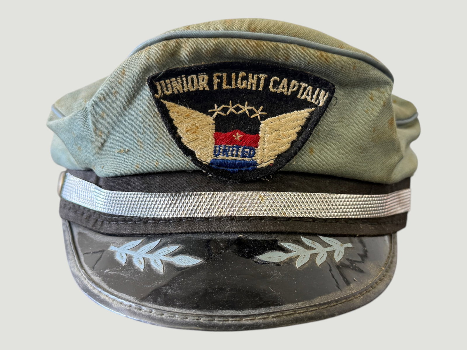 United Airlines Junior Flight Captain Souvenir Pilot Cap, c.1950s-1960s: A vintage United Airlines 'Junior Flight Captain' promotional souvenir cap, issued to young passengers as part of the airline's popular children's goodwill program during the golden age of commercial 