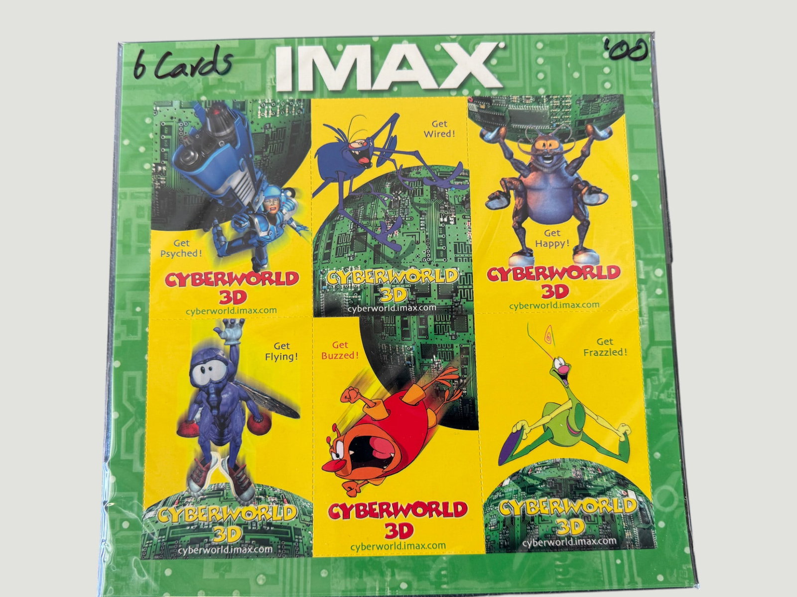 IMAX CyberWorld 3D Promotional Card Set (6 Cards) — Sealed, c.2000: A sealed pack of six promotional collector cards for the IMAX CyberWorld 3D film, released circa 2000. Each card features a different animated character from the film with slogans such as 'Get Wired!'