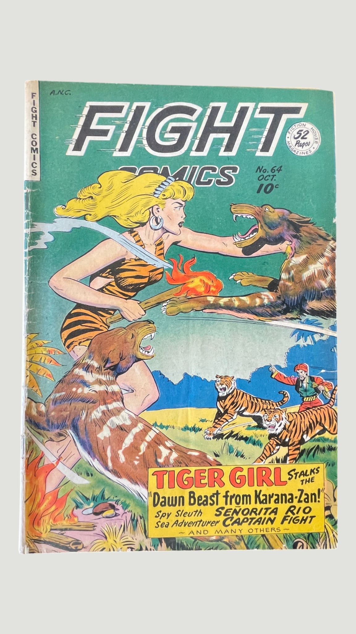 Fight Comics #64, Fiction House Magazines, Oct 1949 — Tiger Girl Cover: Fight Comics No. 64, published by Fiction House Magazines, dated October 1949, priced at 10 cents with 52 pages. This issue features a striking jungle adventure cover depicting Tiger Girl battling wil