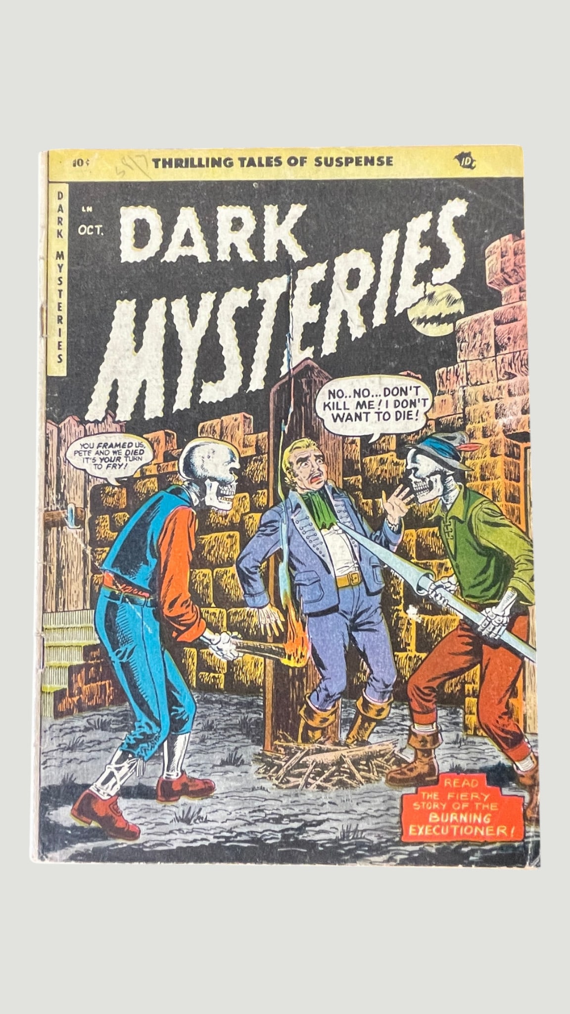 Dark Mysteries #14 Pre-Code Horror Comic, Master Comics, October 1953: Dark Mysteries #14, published by Master Comics (Merit Publications) in October 1953, is a pre-Code horror anthology comic featuring 'Thrilling Tales of Suspense.' The cover depicts a dramatic scene ti