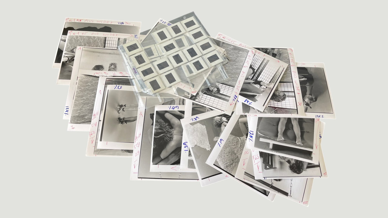 Vintage B&W Photography Proof Prints & 35mm Slides Collection, c.1970s-1980s: A collection of approximately 20+ black and white photographic proof prints alongside a sheet of 35mm slide transparencies in a plastic sleeve, dating from approximately the 1970s-1980s. The prints fe