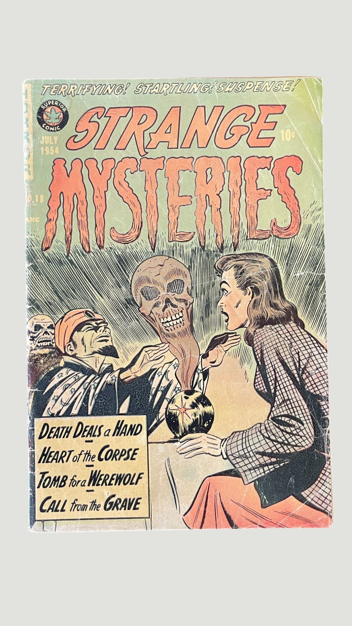 Strange Mysteries #18, Superior Comics, July 1954 — Pre-Code Horror: Strange Mysteries #18, published by Superior Comics (Canada) in July 1954, is a pre-Code horror anthology comic featuring four stories: 'Death Deals a Hand,' 'Heart of the Corpse,' 'Tomb for a Werewol