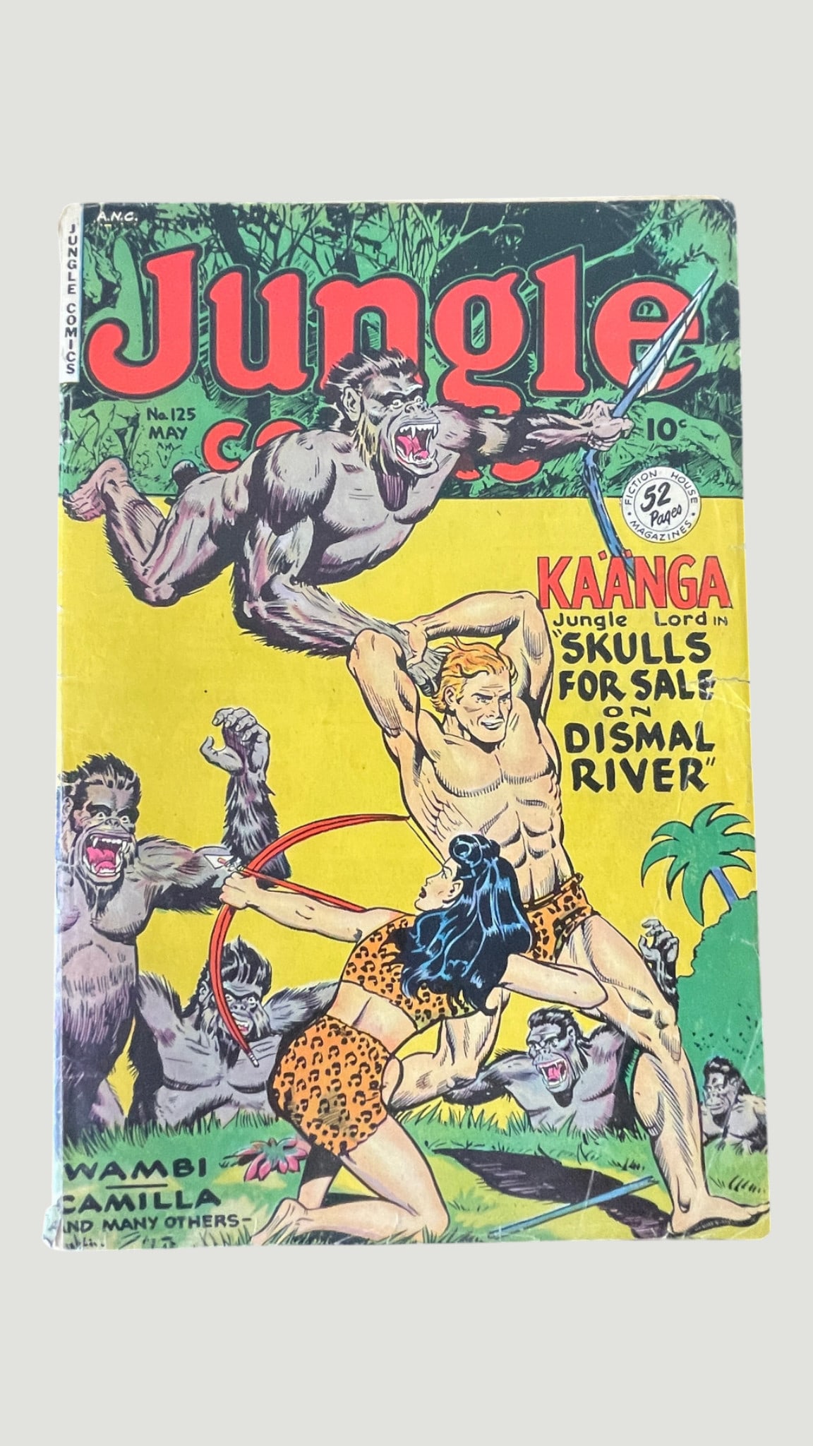 Jungle Comics #125, Fiction House, May 1950 — Ka'anga 'Skulls for Sale on Dismal River': Jungle Comics #125 published by Fiction House (A.N.C.) in May 1950, featuring the lead story 'Skulls for Sale on Dismal River' starring Ka'anga, Jungle Lord. The dynamic cover art depicts Ka'anga and 
