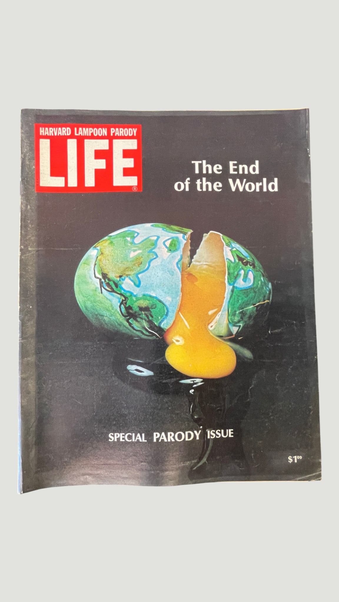 Harvard Lampoon Parody of LIFE Magazine 'The End of the World' Special Issue: A Harvard Lampoon parody issue of LIFE Magazine, themed 'The End of the World,' published as a Special Parody Issue priced at $1.00, suggesting a likely origin in the early-to-mid 1970s. The cover fea