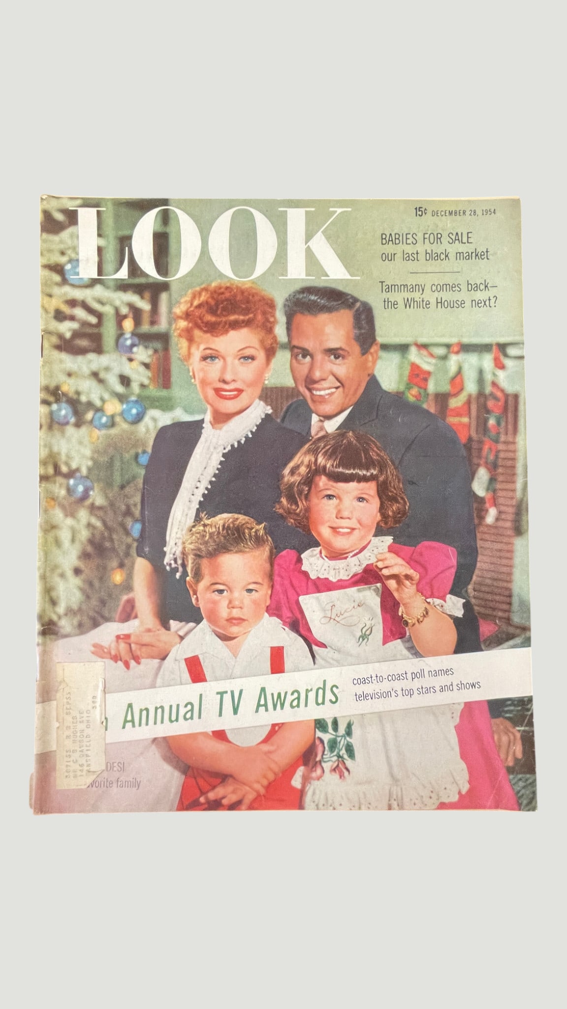 LOOK Magazine December 28, 1954 - Annual TV Awards, Lucille Ball & Desi Arnaz Cover: A vintage issue of LOOK Magazine dated December 28, 1954, featuring a festive Christmas cover photograph of Lucille Ball and Desi Arnaz with two children, captioned as America's favorite family. Price
