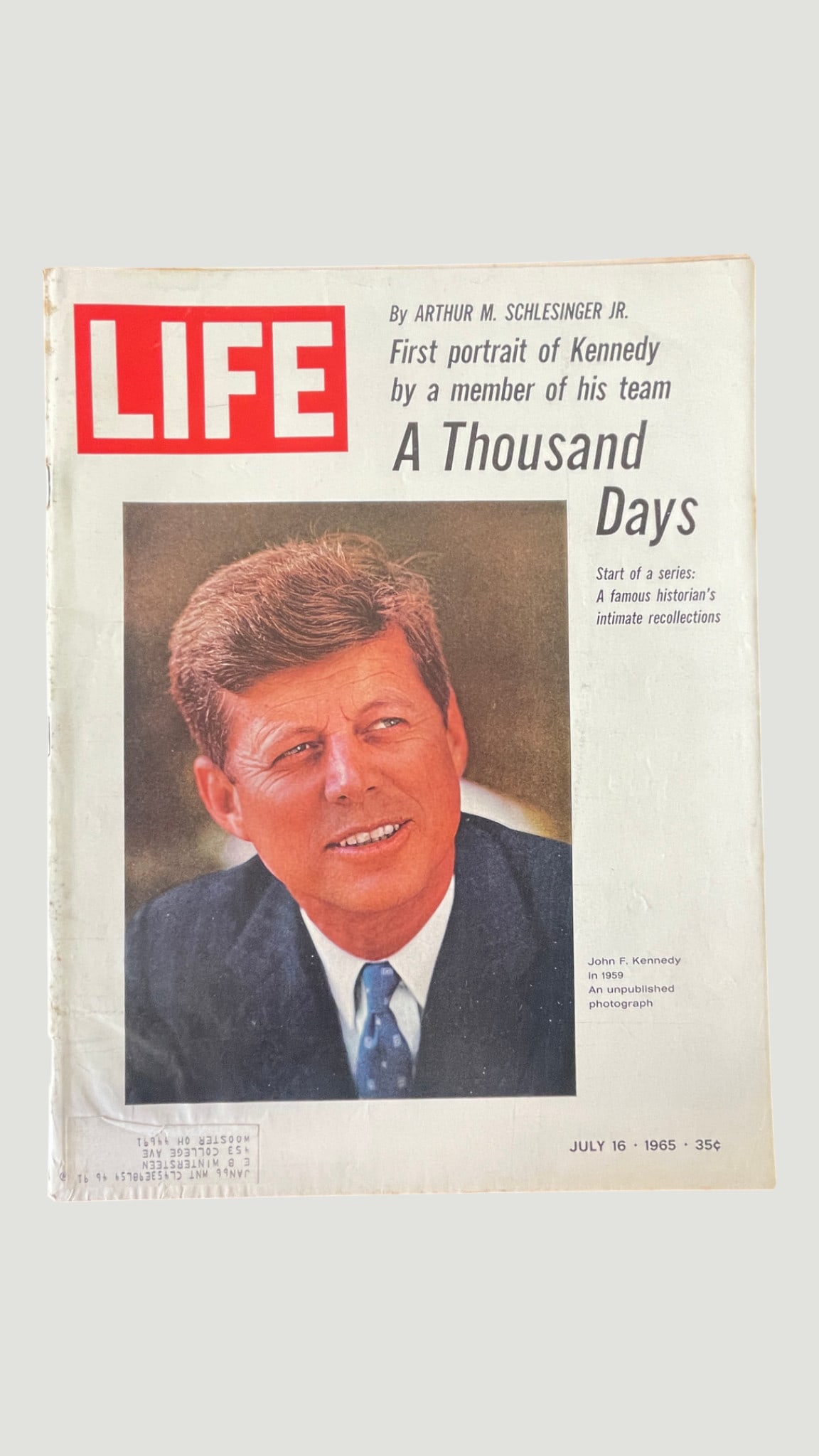 LIFE Magazine July 16 1965 – JFK 'A Thousand Days' Schlesinger Cover: A July 16, 1965 issue of LIFE Magazine featuring an unpublished 1959 photograph of President John F. Kennedy on the cover. The issue marks the beginning of a serialized excerpt from Arthur M. Schlesin