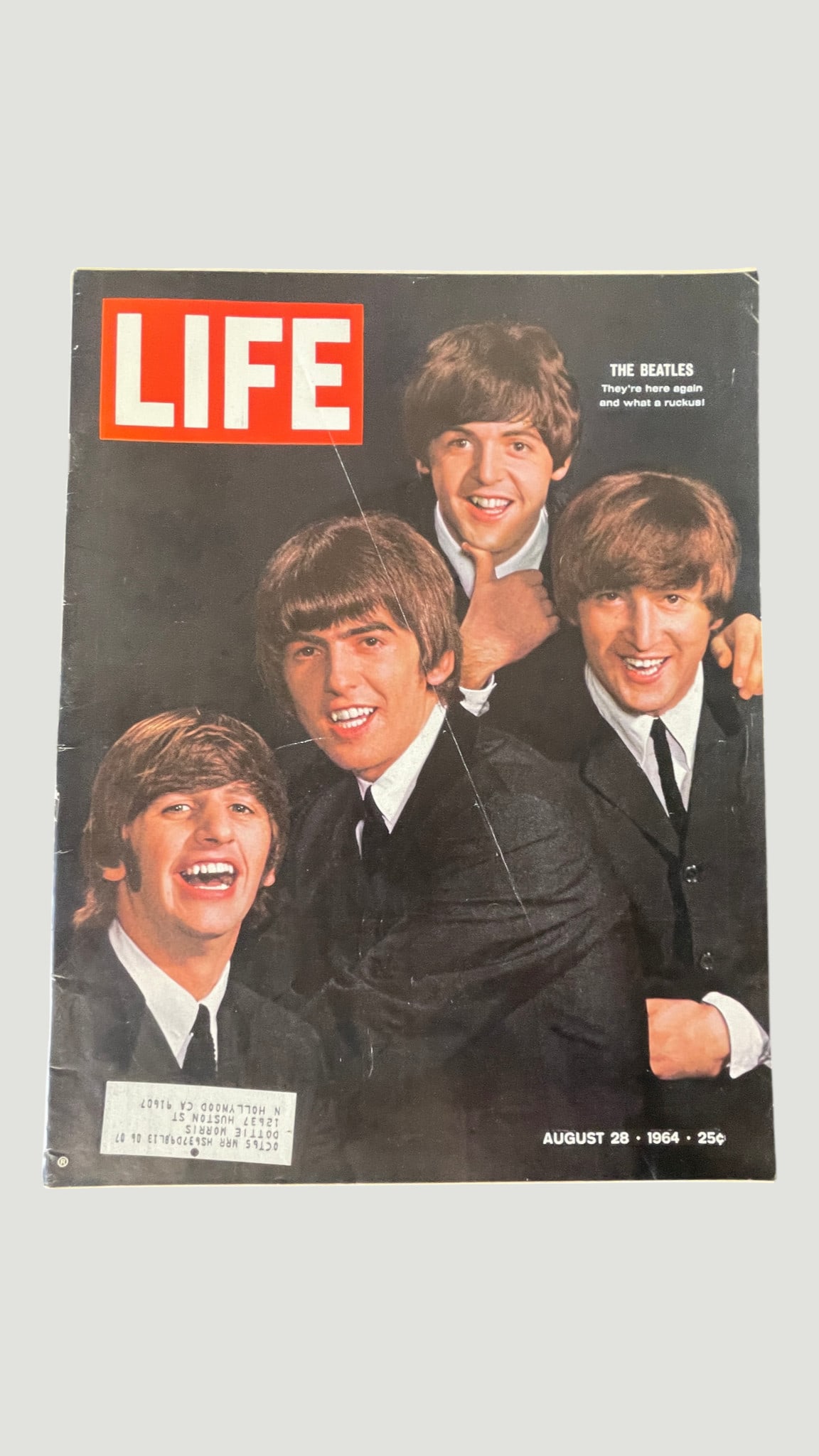 LIFE Magazine August 28, 1964 — The Beatles Cover 'They're Here Again': A highly collectible issue of LIFE Magazine dated August 28, 1964, featuring The Beatles on the cover with the headline 'They're here again and what a ruckus!' — referencing the band's second Americ