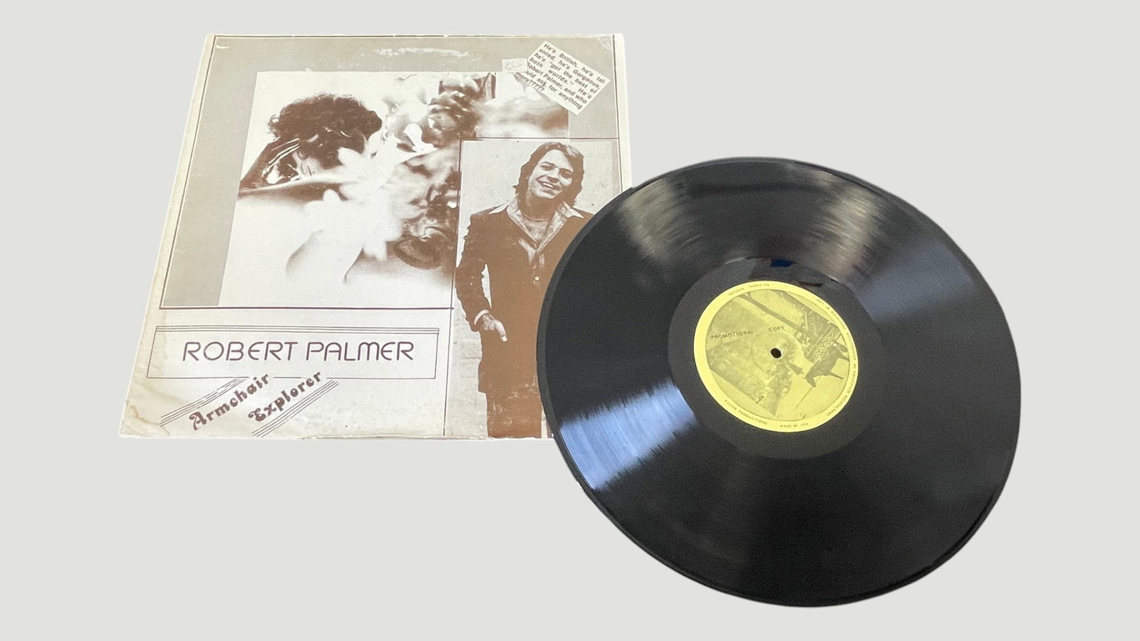 Robert Palmer 'Armchair Explorer' Promotional Vinyl LP Record Island Records: A promotional copy of Robert Palmer's 'Armchair Explorer' LP, a rare bootleg/unofficial compilation release featuring the British rock and soul artist who rose to fame in the 1970s and 1980s. The reco