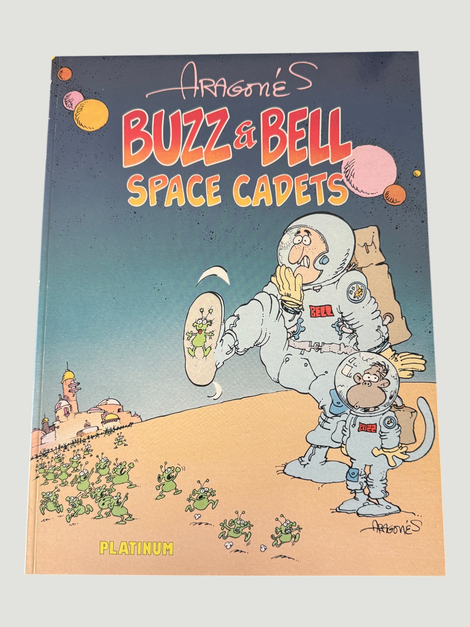 Aragonés Buzz & Bell Space Cadets Graphic Novel — Platinum Edition, Signed and Sketched: Buzz & Bell Space Cadets by renowned MAD Magazine cartoonist Sergio Aragonés, published by Platinum Studios. This humorous science fiction graphic novel features Aragonés's signature comedic artwork