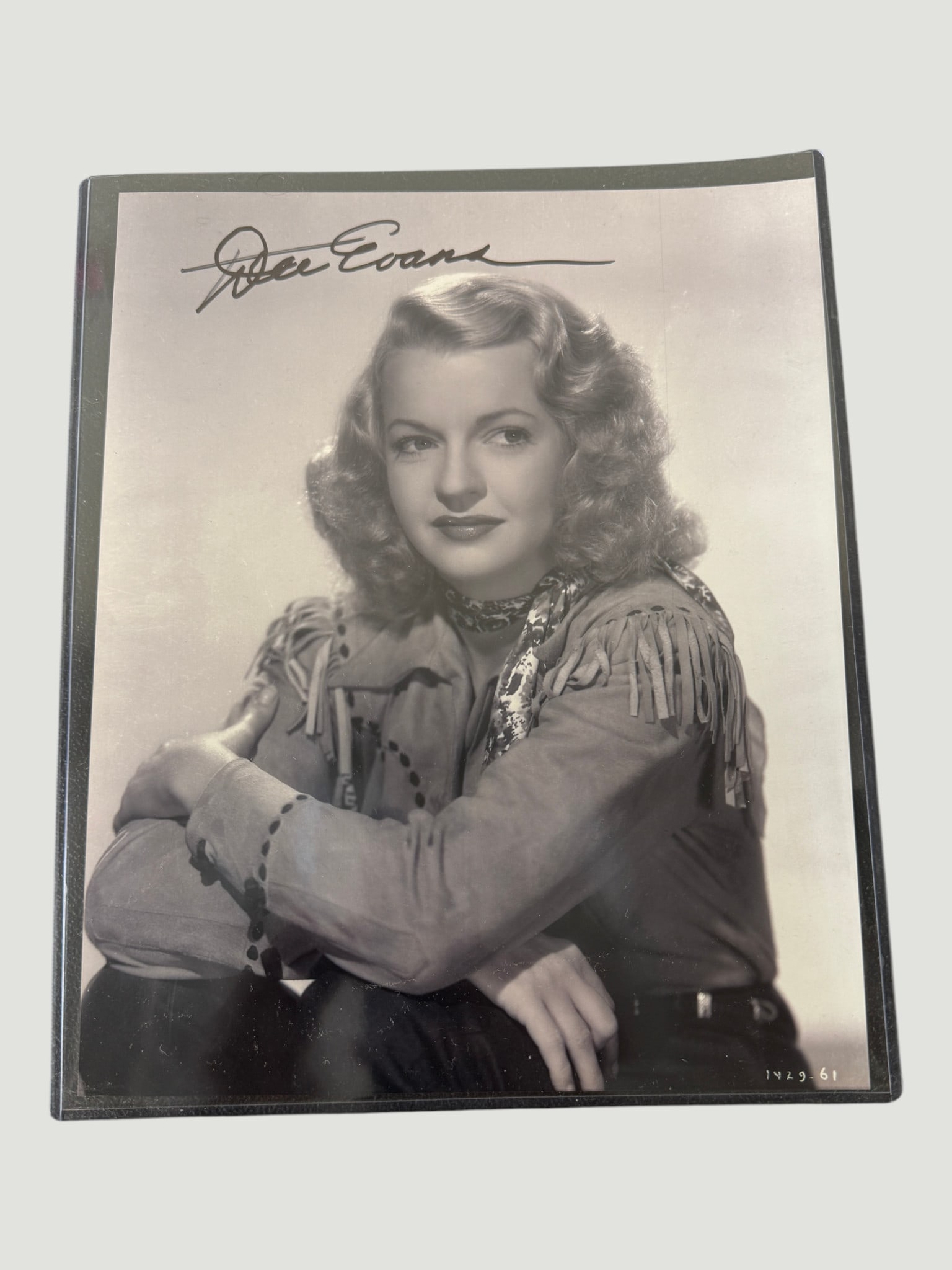Dale Evans Signed 8x10 Black & White Promotional Photo, c.1940s-1950s: A vintage black and white 8x10 promotional photograph of Dale Evans, the 'Queen of the West' and celebrated actress, singer, and wife of Roy Rogers. Evans is depicted wearing a classic Western fringed