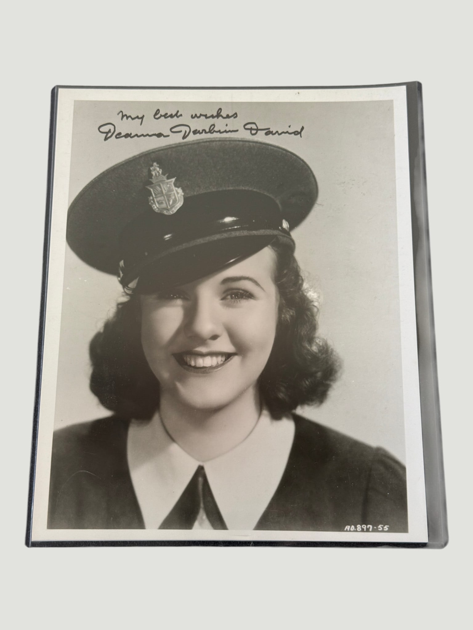 Deanna Durbin Signed Vintage Publicity Photo 'My Best Wishes' c.1940s: A vintage black-and-white promotional photograph of Hollywood singing star Deanna Durbin, signed in ink 'My best wishes, Deanna Durbin David' — the surname 'David' referring to her married name afte