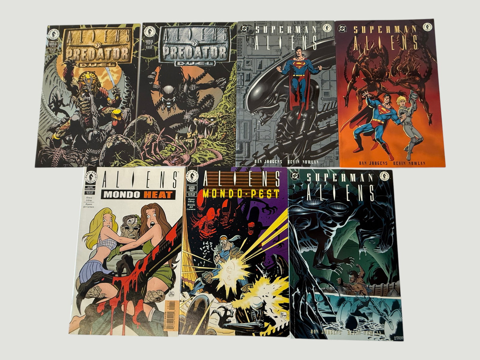 Dark Horse Comics Aliens Crossover Collection – 7 Issues, 1990s: A collection of seven Dark Horse Comics titles featuring Aliens crossover series from the 1990s, including 'Aliens vs. Predator: Duel' #1 and #2 (complete mini-series), 'Superman vs. Aliens' #1, #2, a
