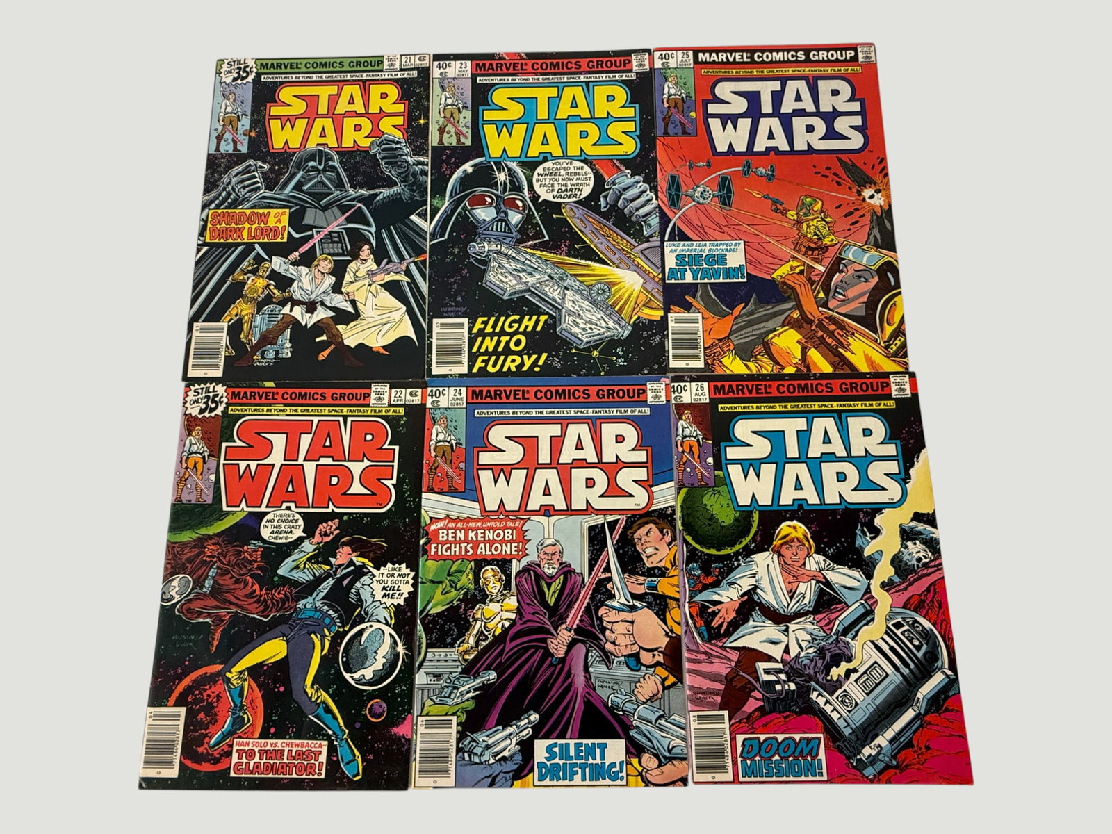 Star Wars Marvel Comics #21-26 Complete Run 1979 Bronze Age Set of 6: A consecutive run of six Marvel Comics Star Wars issues numbered 21 through 26, published in 1979 during the Bronze Age of comics. Titles include 'Shadow of a Dark Lord,' 'To the Last Gladiator,' 'Fli