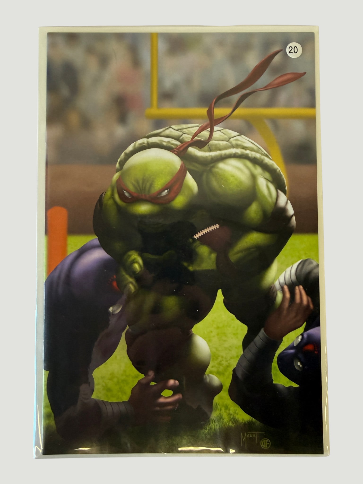 TMNT Teenage Mutant Ninja Turtles Raphael Football Virgin Variant Comic Cover: A striking variant cover art print or comic book featuring Raphael from Teenage Mutant Ninja Turtles in a photorealistic style, depicted playing American football on a stadium field. The artwork is si