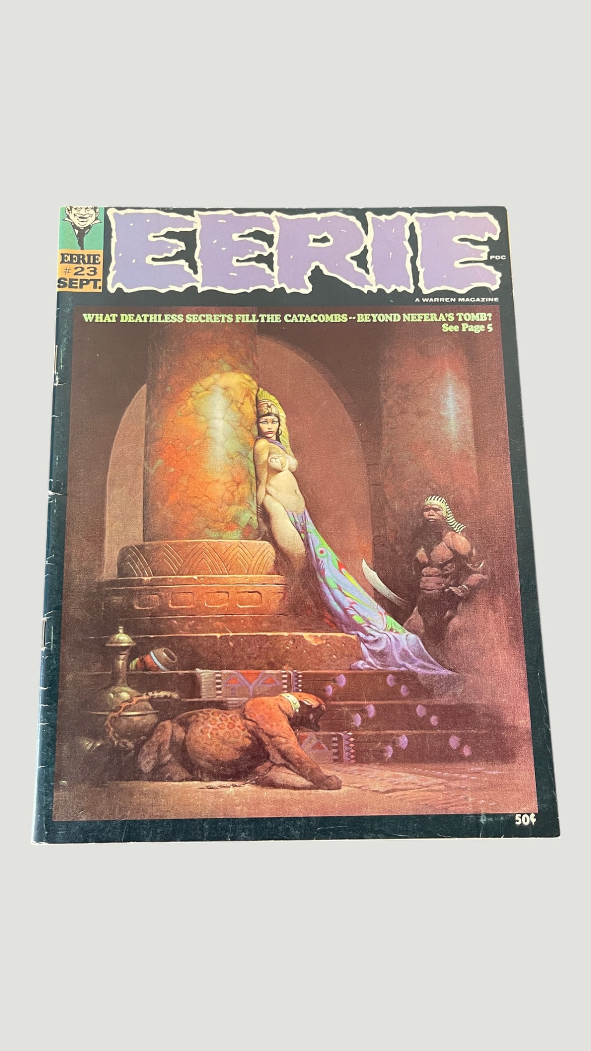 Eerie #23 Warren Magazine Sept 1969 Horror Comic Frank Frazetta Cover Art: Eerie #23, published by Warren Publishing, dated September 1969, priced at 50 cents. This issue features a striking Egyptian-themed cover painting by Frank Frazetta depicting a scantily clad queen fig