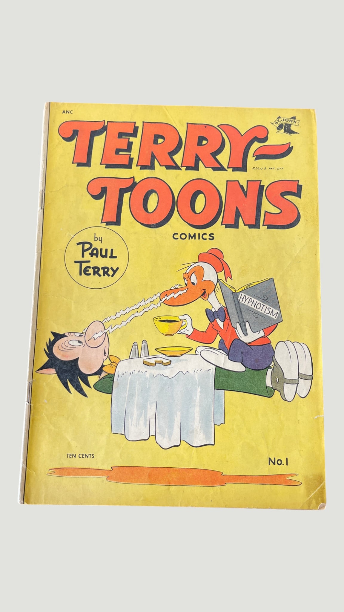 Terry-Toons Comics #1 by Paul Terry, St. John Publishing, 1952: Terry-Toons Comics No. 1, published by St. John Publishing under the ANC banner, featuring cover art by Paul Terry's studio with the iconic hypnotism gag scene. This is the first issue of the St. John