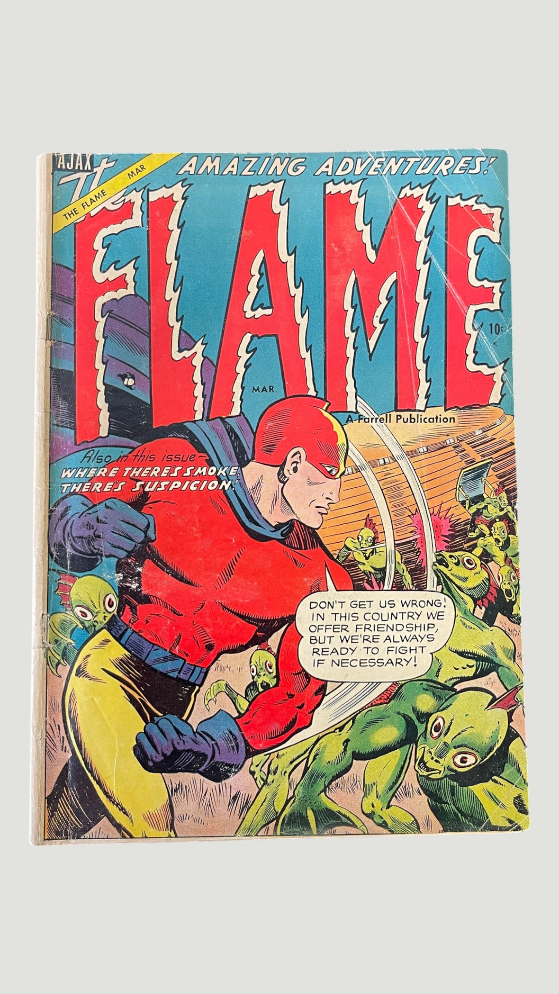 The Flame #1 Ajax-Farrell Publication 1954 Golden Age Superhero Comic: The Flame #1, published by Ajax-Farrell (a Farrell Publication) in March 1954, featuring 'Amazing Adventures' of the superhero The Flame. The cover depicts the Flame battling green alien/monster creat