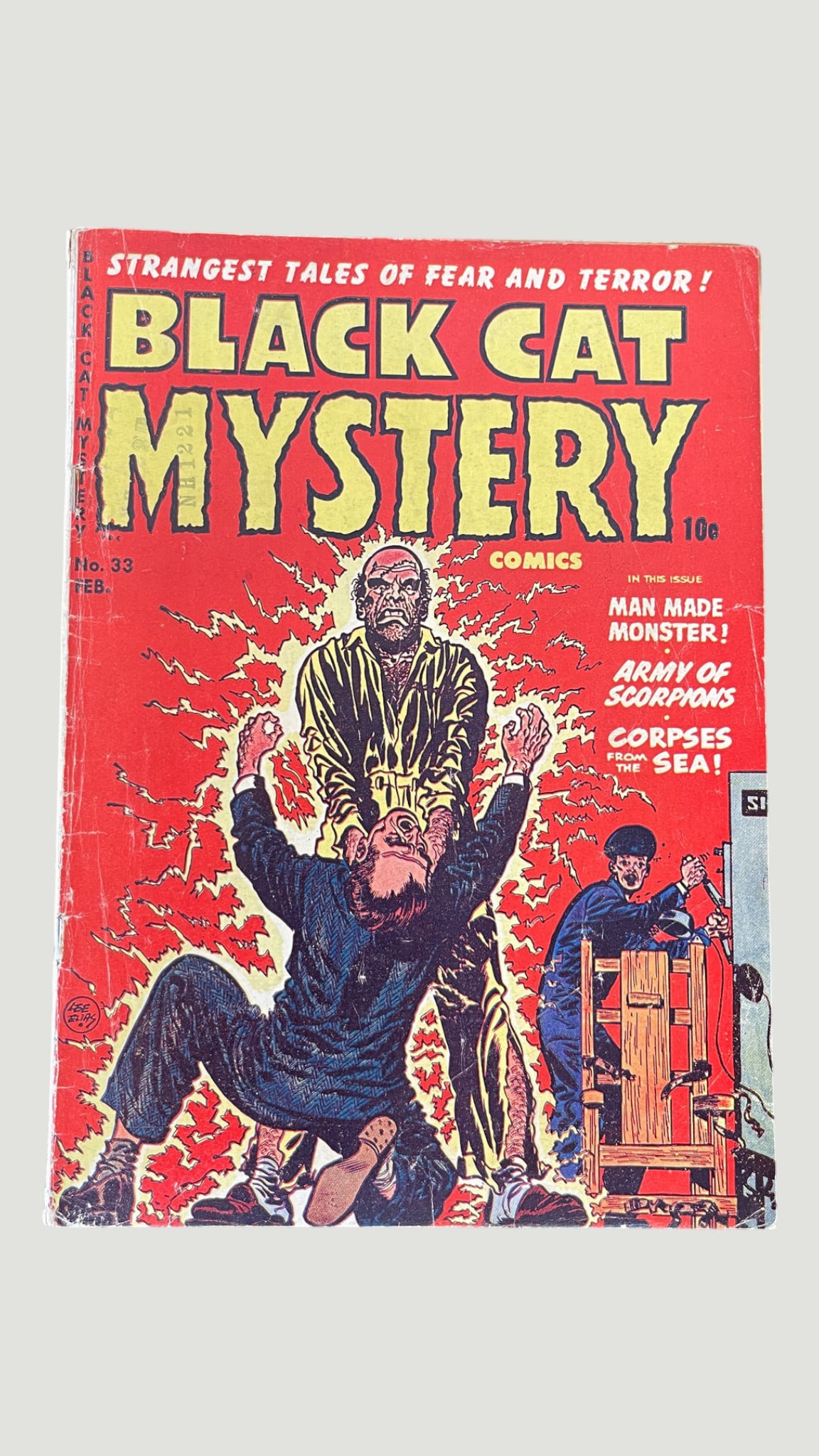 Black Cat Mystery Comics #33, Harvey Publications, Feb 1952 — Pre-Code Horror: Black Cat Mystery Comics #33, published by Harvey Publications, February 1952, priced at 10 cents. This pre-Code horror anthology issue features three stories: 'Man Made Monster!', 'Army of Scorpions'