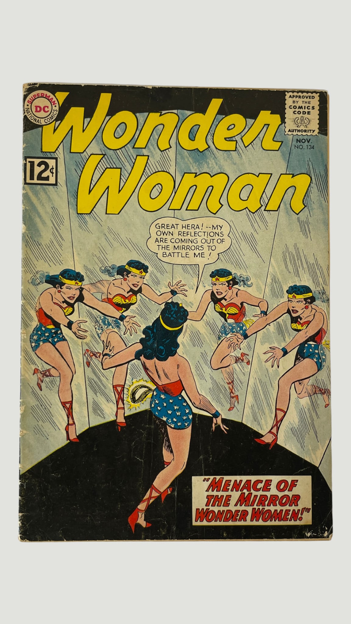 Wonder Woman #134 DC Comics Nov 1962 'Menace of the Mirror Wonder Women': Wonder Woman #134, published by DC Comics (Superman National Comics) in November 1962, featuring the story 'Menace of the Mirror Wonder Women!' with a striking cover depicting Wonder Woman surrounded 