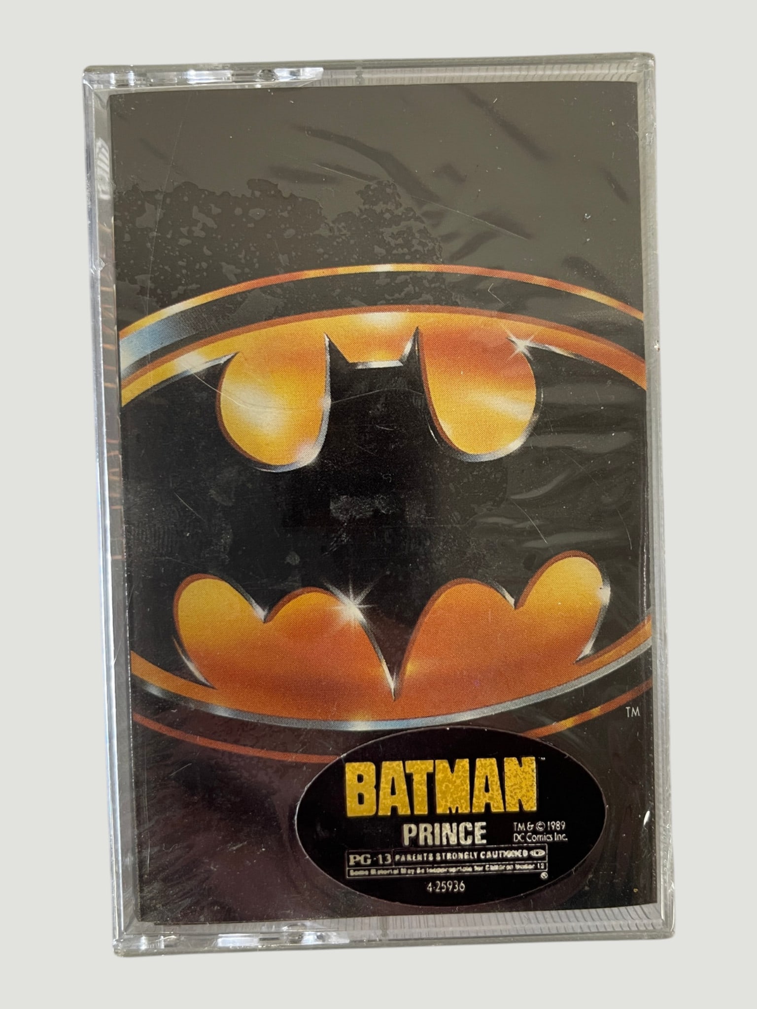 Batman Soundtrack by Prince (1989) Original Cassette Tape - Warner Bros.: This is the original 1989 soundtrack cassette tape for the Tim Burton-directed Batman film, featuring music by Prince. Released on Warner Bros. Records, this iconic album includes hits such as 'Batdan