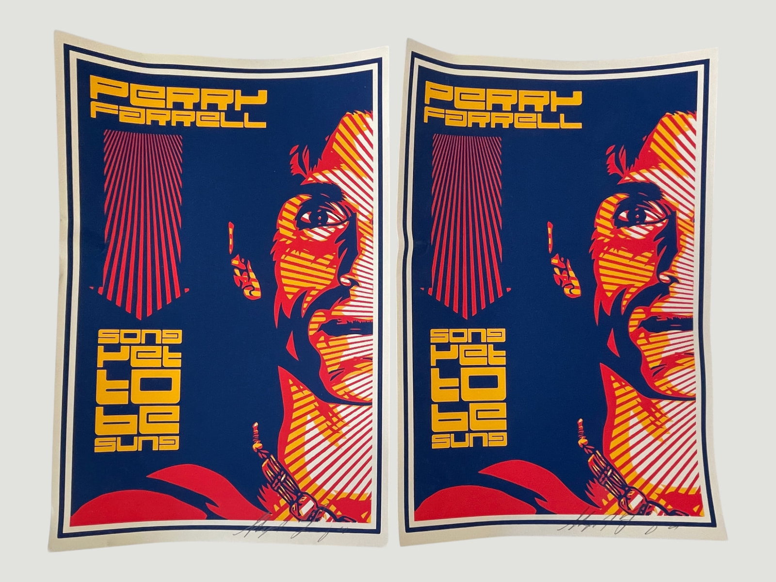 Perry Farrell 'Song Yet To Be Sung' Signed Screen Print Posters x2 (Shepard Fairey): A pair of identical Perry Farrell 'Song Yet To Be Sung' promotional screen print posters, created in the distinctive style of Shepard Fairey (OBEY Giant), featuring a bold graphic portrait of Jane's A