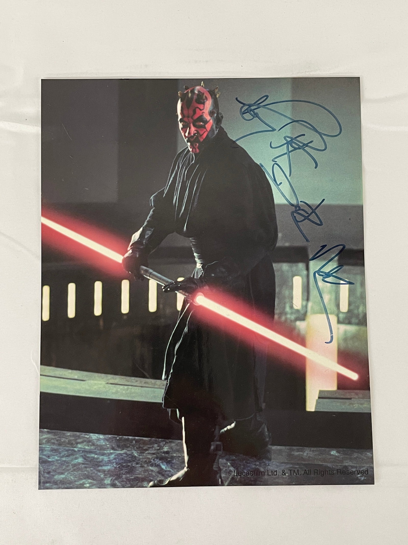 Star Wars Darth Maul Signed Lucasfilm 8x10 Photo - Ray Park Autograph: An official Lucasfilm Ltd. licensed 8x10 promotional photograph depicting Darth Maul wielding his iconic double-bladed red lightsaber, bearing the official '©Lucasfilm Ltd. & TM. All Rights Reserved'