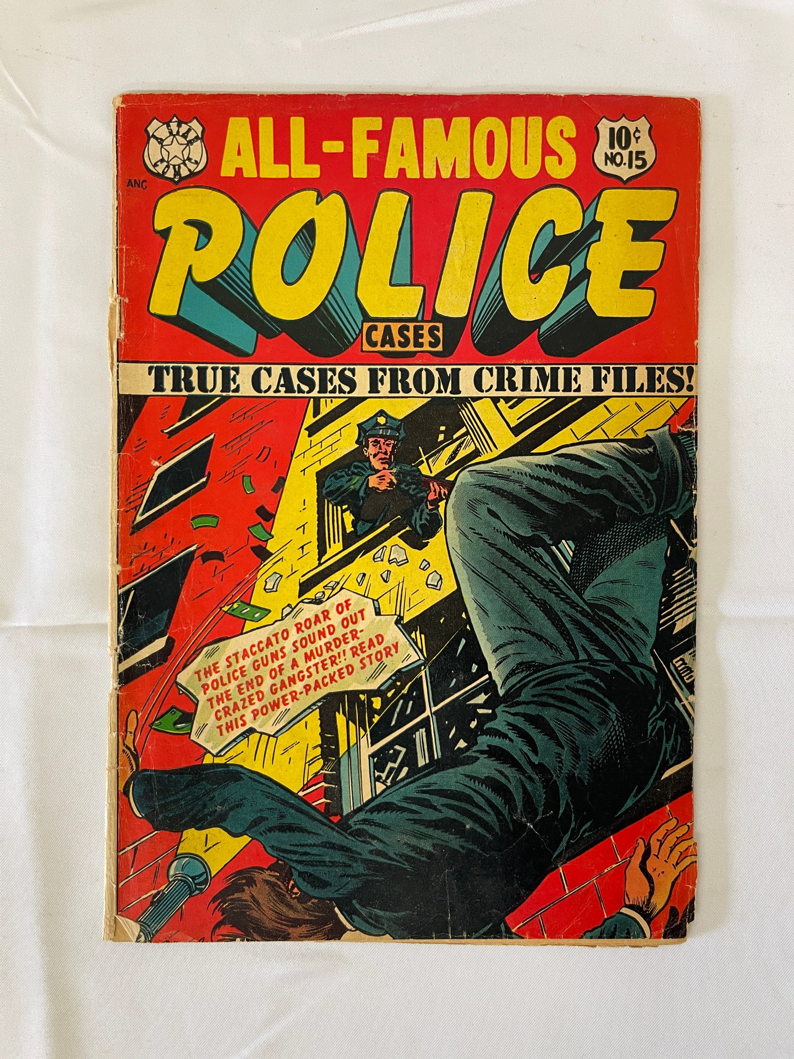 All-Famous Police Cases #15 (Star Publications, 1954) Golden Age Crime Comic: All-Famous Police Cases #15, published by Star Publications in 1954, is a Golden Age crime comic featuring 'True Cases from Crime Files!' The cover depicts a dramatic action scene with a figure fallin