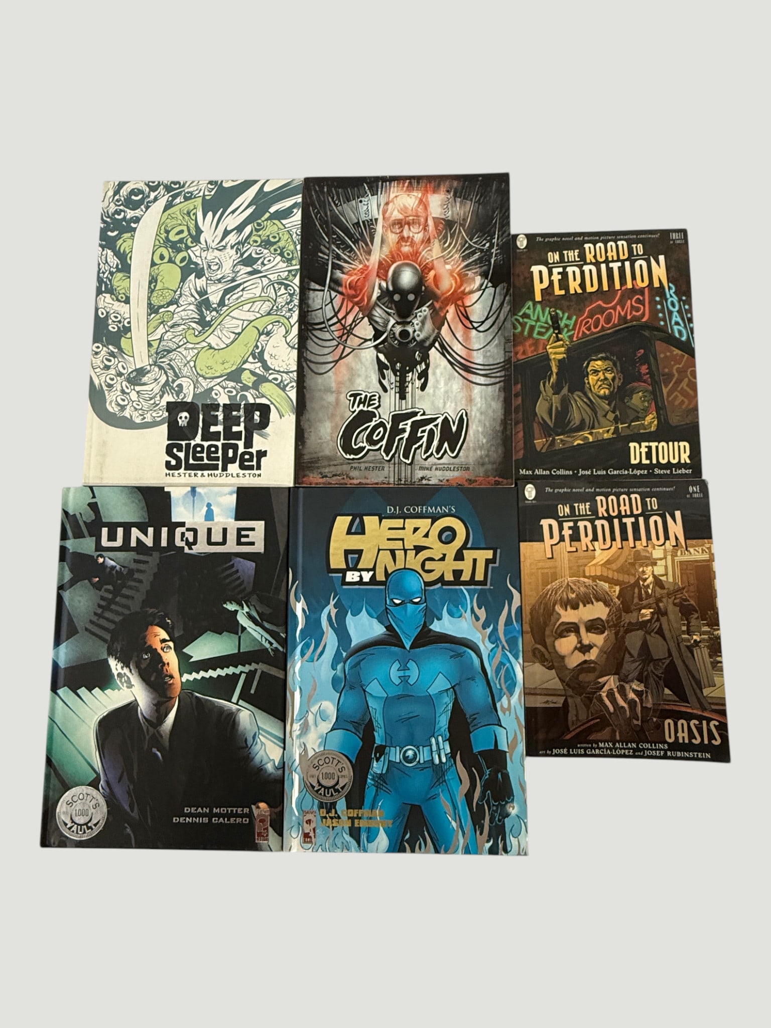 Graphic Novel Lot: Deep Sleeper, The Coffin, Hero By Night, Unique & Road to Perdition (1 of 2)