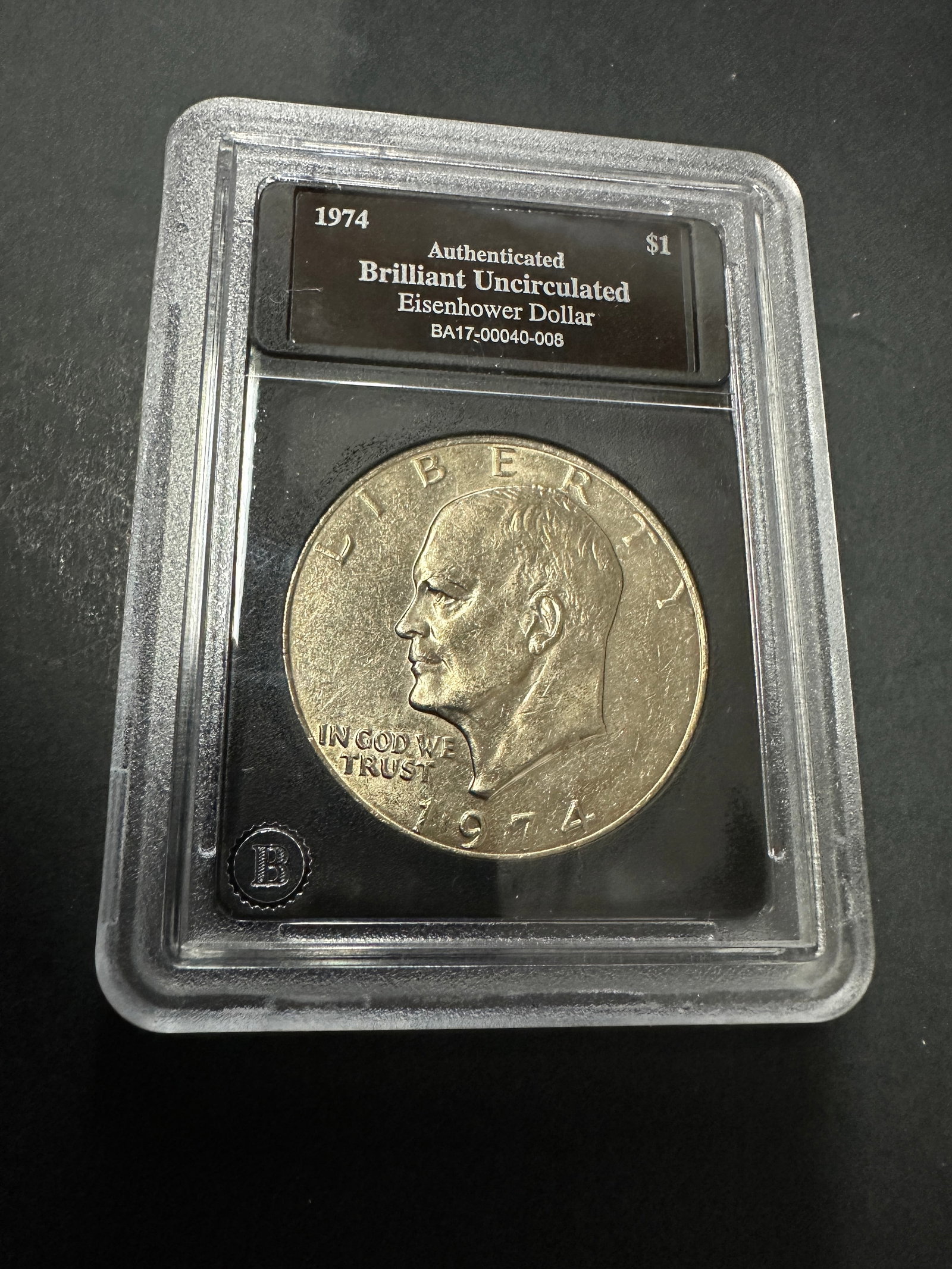 1974 Eisenhower Dollar Brilliant Uncirculated $1 Coin Authenticated Slab (1 of 1)