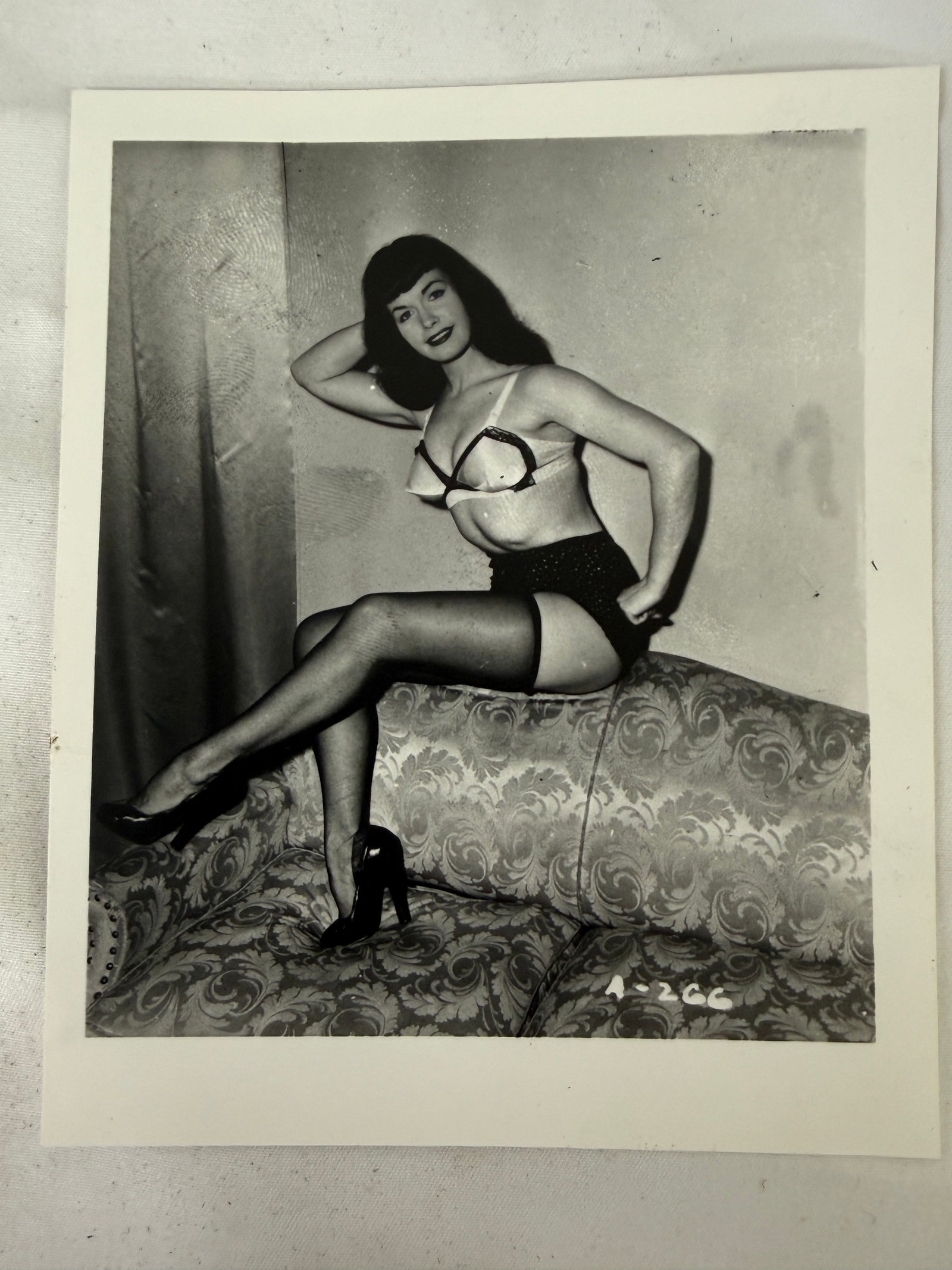 Vintage 1950s Irving Klaw Bettie Page Original B&W Pin Up Photograph: Vintage 1950s Irving Klaw Bettie Page Original B&W Pin Up Photograph. 3" x 5". Printed from the original negative.