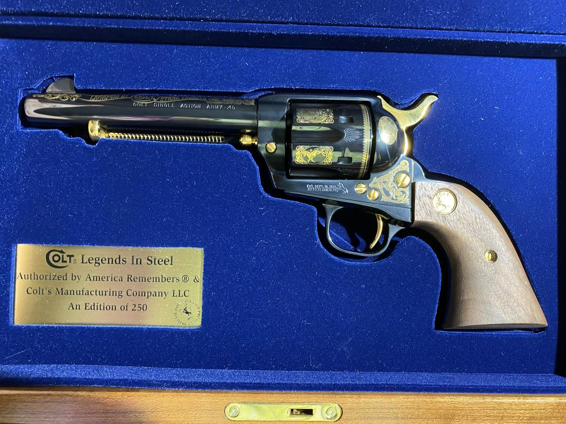 Colt 45 Cal Peacemaker Single Action Army Revolver: Authentic functional Colt Peacemaker Single Action Army customized in an edition of 250 by America Remembers. In its display case. In mint or like new condition. Serial: S46620A. I would say this is u