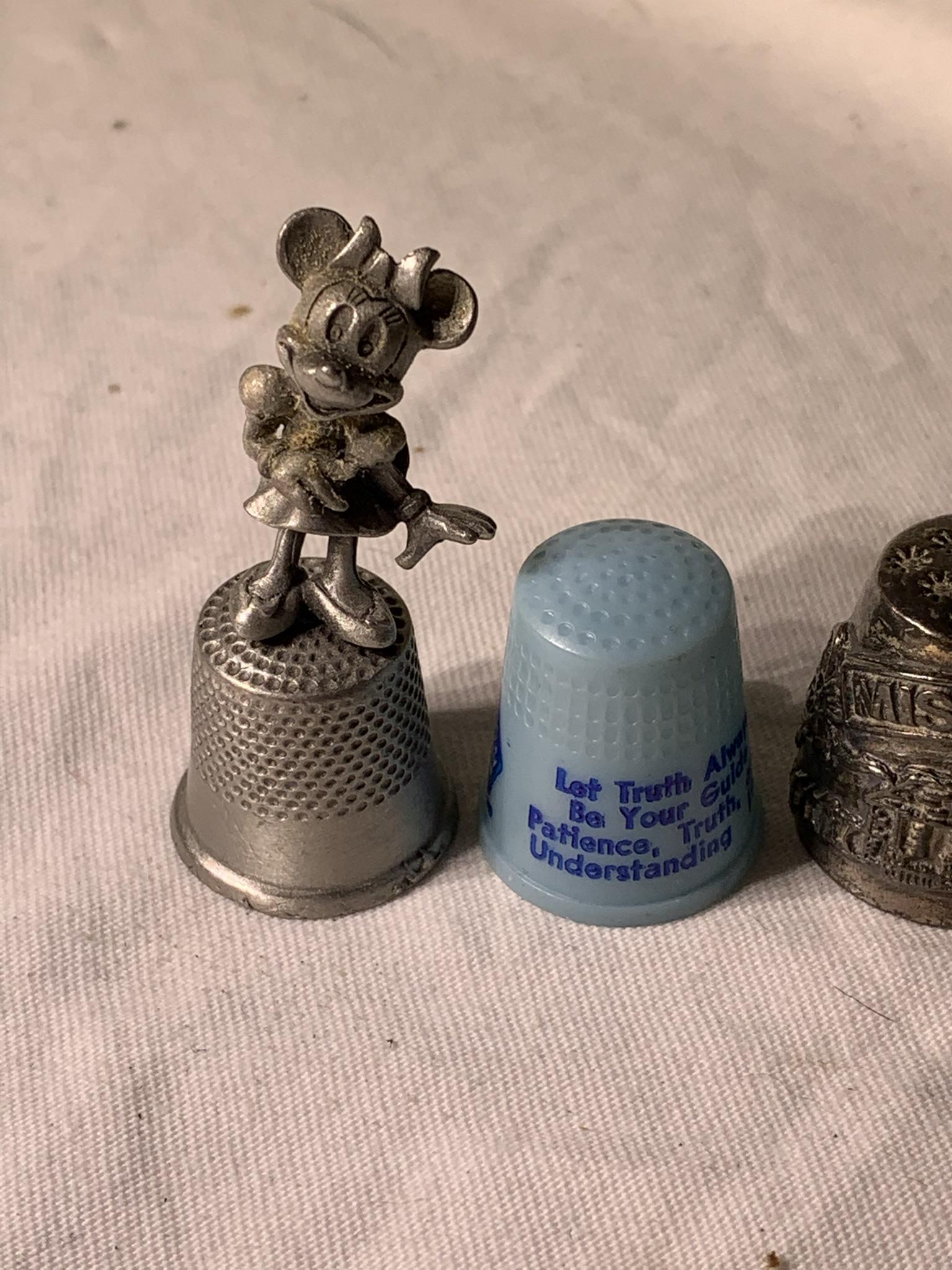 Mickey Mouse Watch, Minnie Mouse Thimble, and: Free pickup or we will drop at the shipper for a $3 fee.