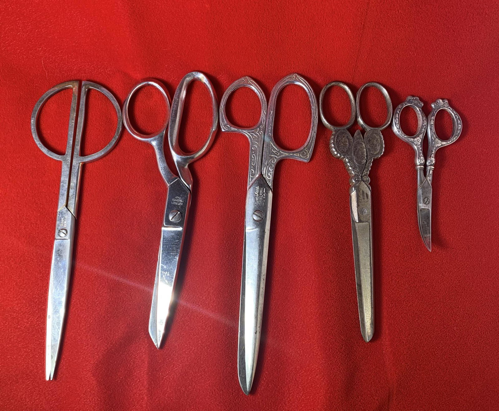 5 Pairs of Ornate Scissors. Some are Sterling, See: Free pickup or we will drop at the shipper for a $3 fee.