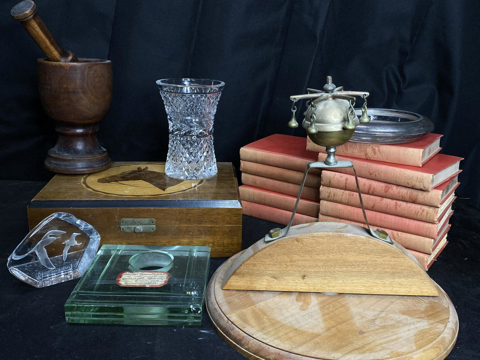 Group lot of assorted better antiques: Group lot of assorted better antiques Early wooden mortar and pestle, Waterford vase, poker chip box with inlaid horse, inkwell holder, Sleigh or horse tack bell, ashtray with sterling silver ring, ol