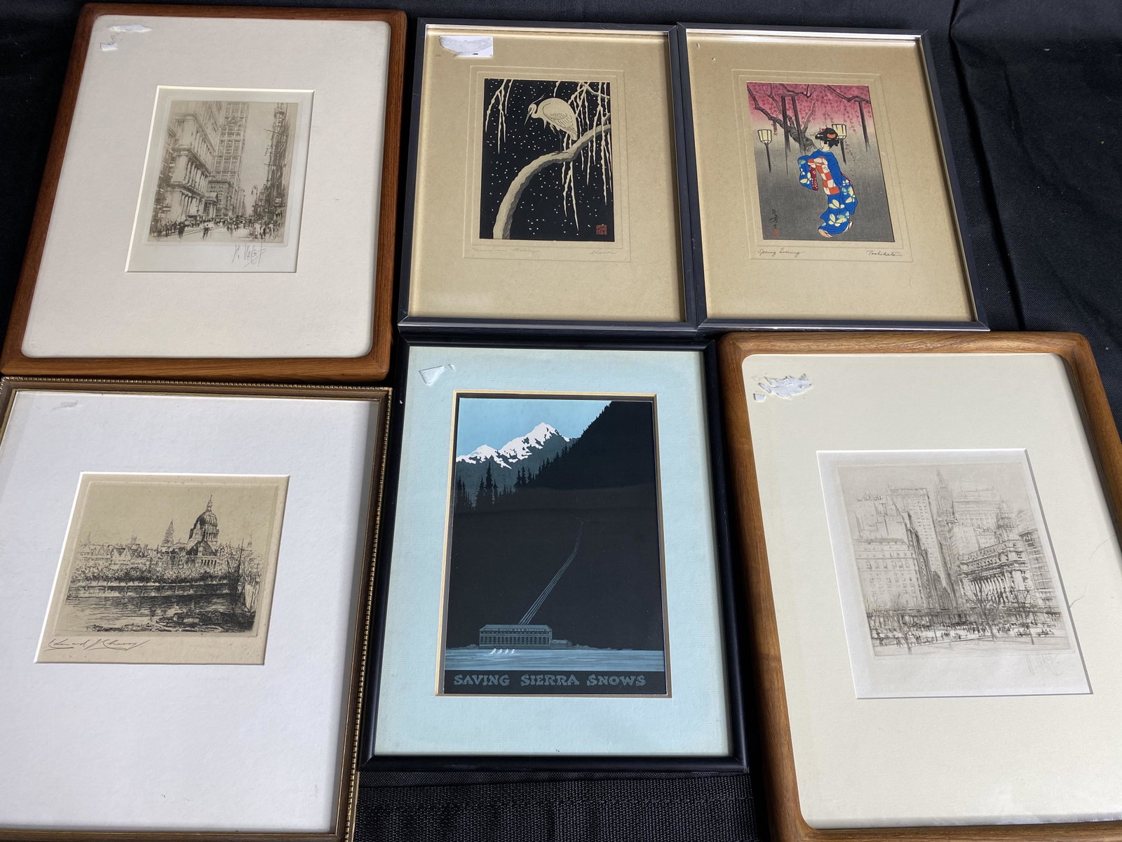 Group lot of framed art including Japanese Prints: Framed etching by Edward J. Cherry, illegibly signed etchings, Saving Sierra Snows western print, Heron on Willow woodblock print, Spring Evening Japanese print by Toshikata. Free pickup or we'll drop