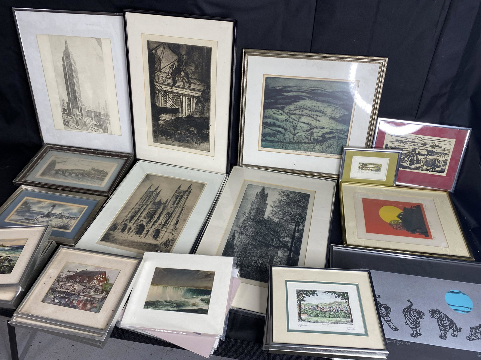 Large lot of etchings, framed art and more: Includes Jack Bilander etching, illegibly signed and unsigned etchings, Sara Amatniek, prints of water colors and more. Shipping not available, you must pickup during the pickup window of Noon to 4 pm