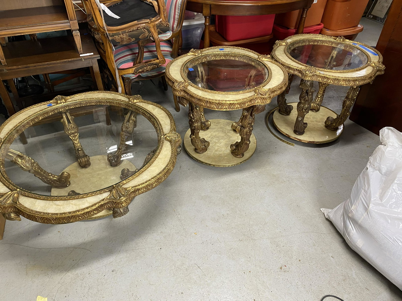 Group lot of 3 Italian Style Side Tables.: Group lot of 3 Italian Style Side Tables. Each with a glass top. 40" across, 28" across and 27" across. Shipping not available, you must pickup during the pickup window of Noon to 4 pm.