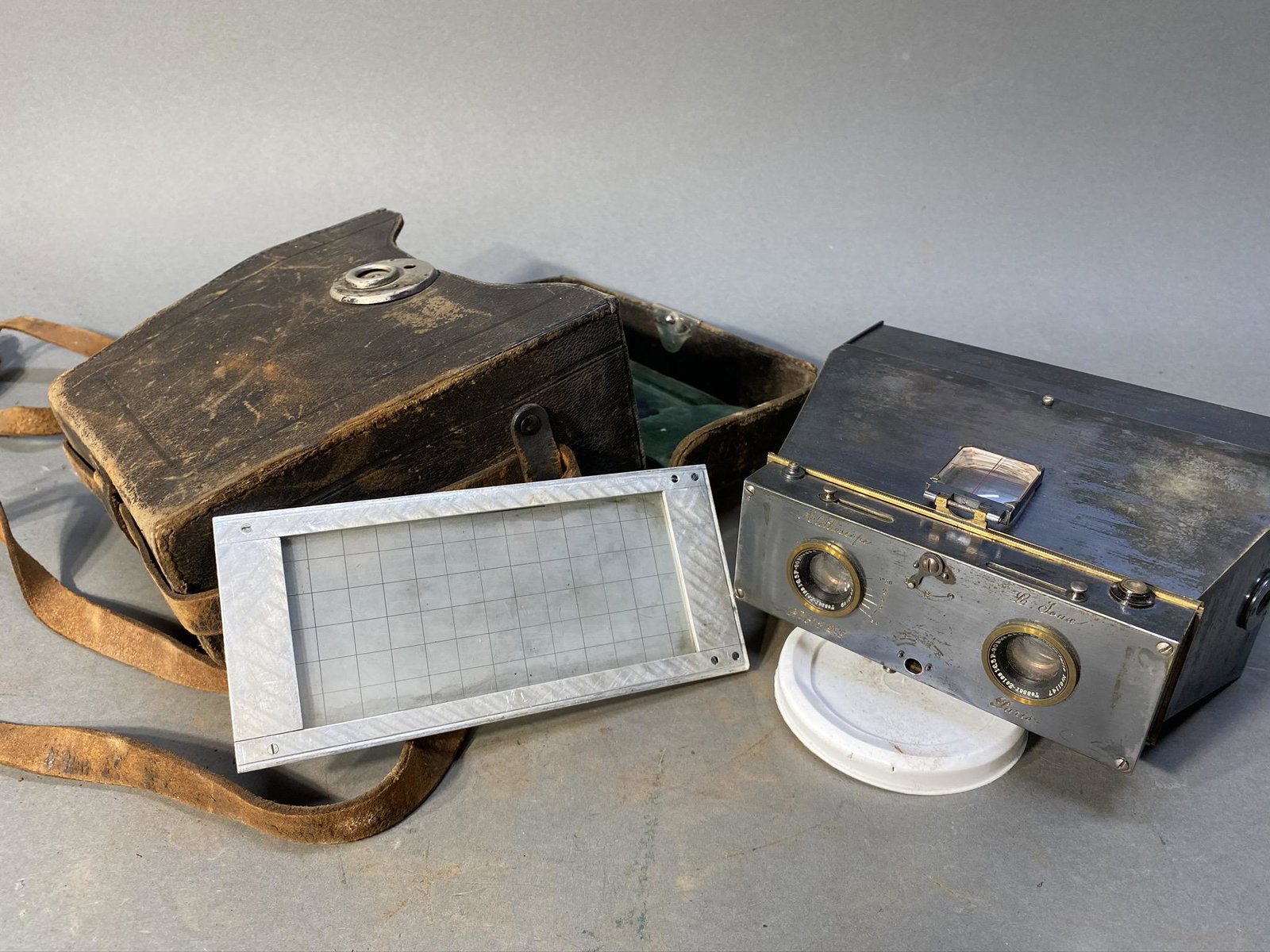 Antique Alethoscope Stereo Camera Made in Paris: Antique Alethoscope Stereo Camera Made in Paris. 6.25" long. With case and additional component. The small lower adjuster knob is present and inserts into its hole, but needs to be reattached, as it f