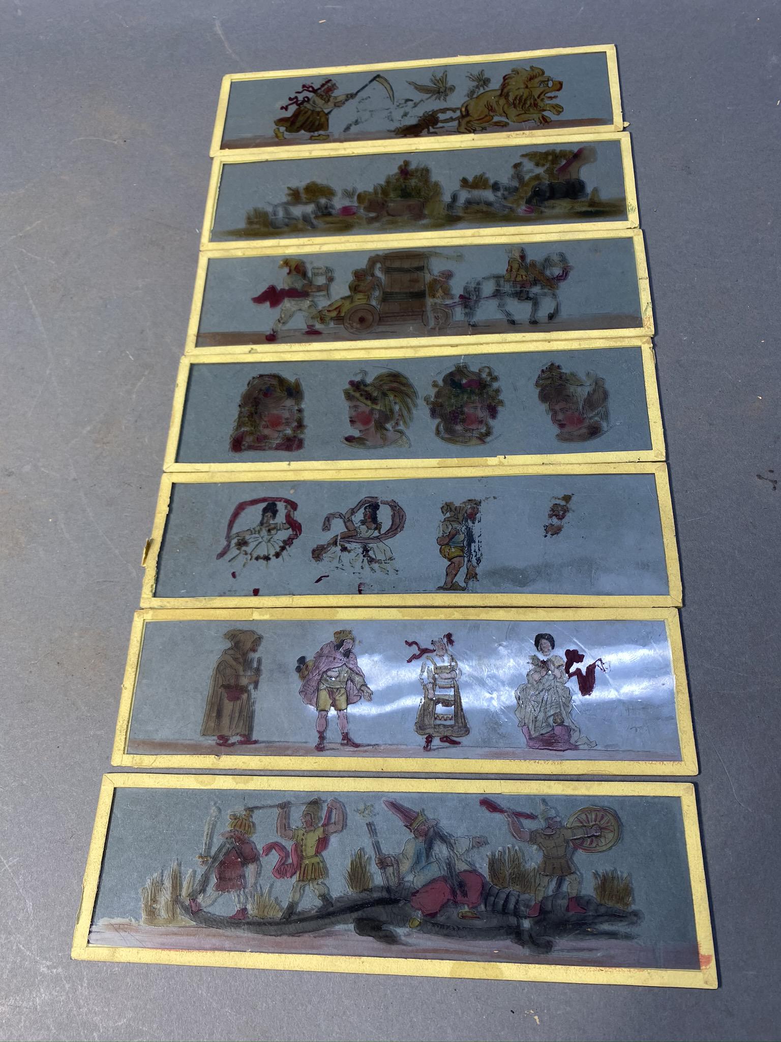 Group of 7 Rectangular glass magic lantern slides: Group of 7 Rectangular glass magic lantern slides. Each is 8.75" long. Free pickup or we'll drop at our shipper for a $3 drop off fee.