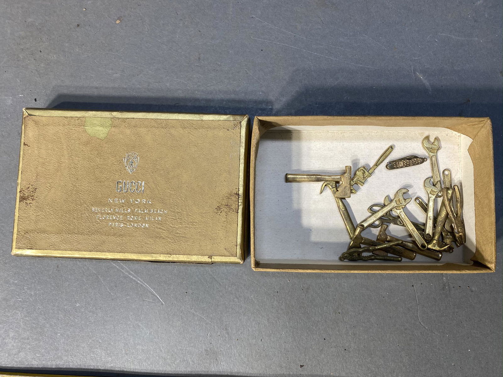 Unusual Vintage Gucci box w/Miniature Tools: Unusual Vintage Gucci box w/Miniature Tools. Box is 4.25" long. Free pickup or we'll drop at our shipper for a $3 drop off fee.