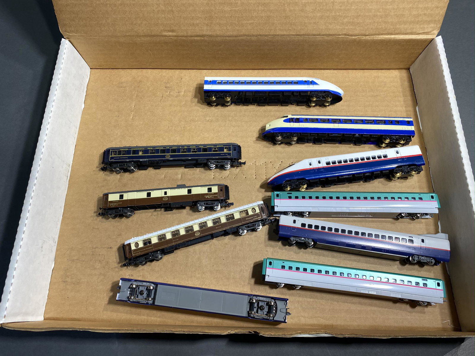 Group of assorted N Scale Model Railroad Trains.: Group of assorted N Scale Model Railroad Trains. The pickup window for the sale is Jan 15 between 10 am and 4 pm in Worthington, Ohio. If you need shipping, we will charge $3/lot to transport to our w