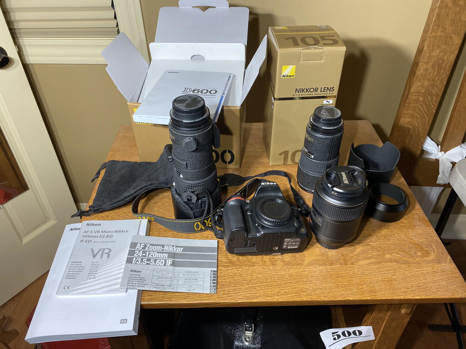 Nikon Camera and Lenses Lot.: Nikon Camera and Lenses Lot. Nikon D600 camera body with box, manual. Lenses: 300mm; SWM VR MIcro1:1 105mm; 180 mm; 85 mm. Free pickup during the pickup window in Monticello, IL on Jan 30 from 10 am t